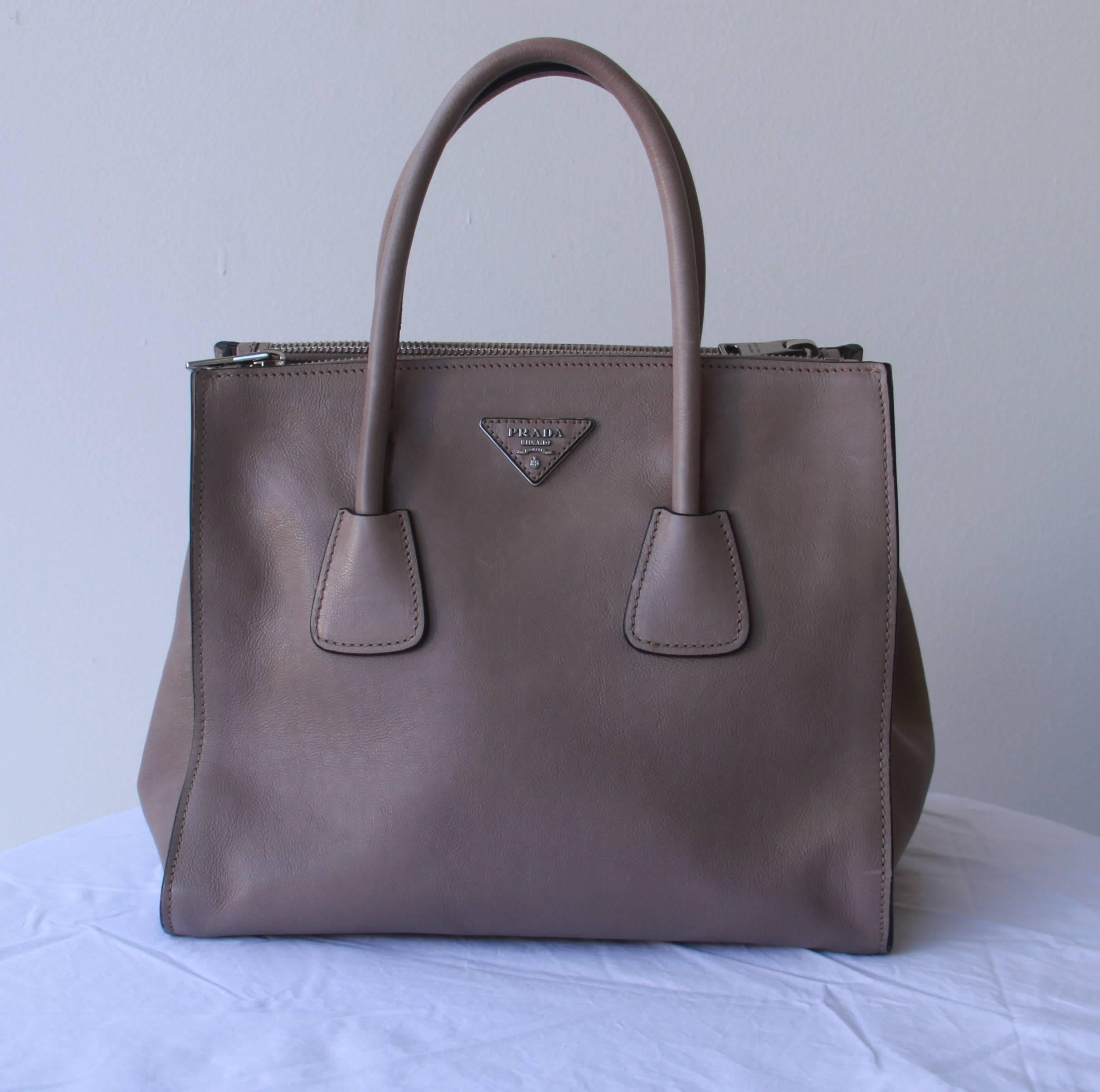 Recent Prada bag from 2014.

The bag is new with the original tags.