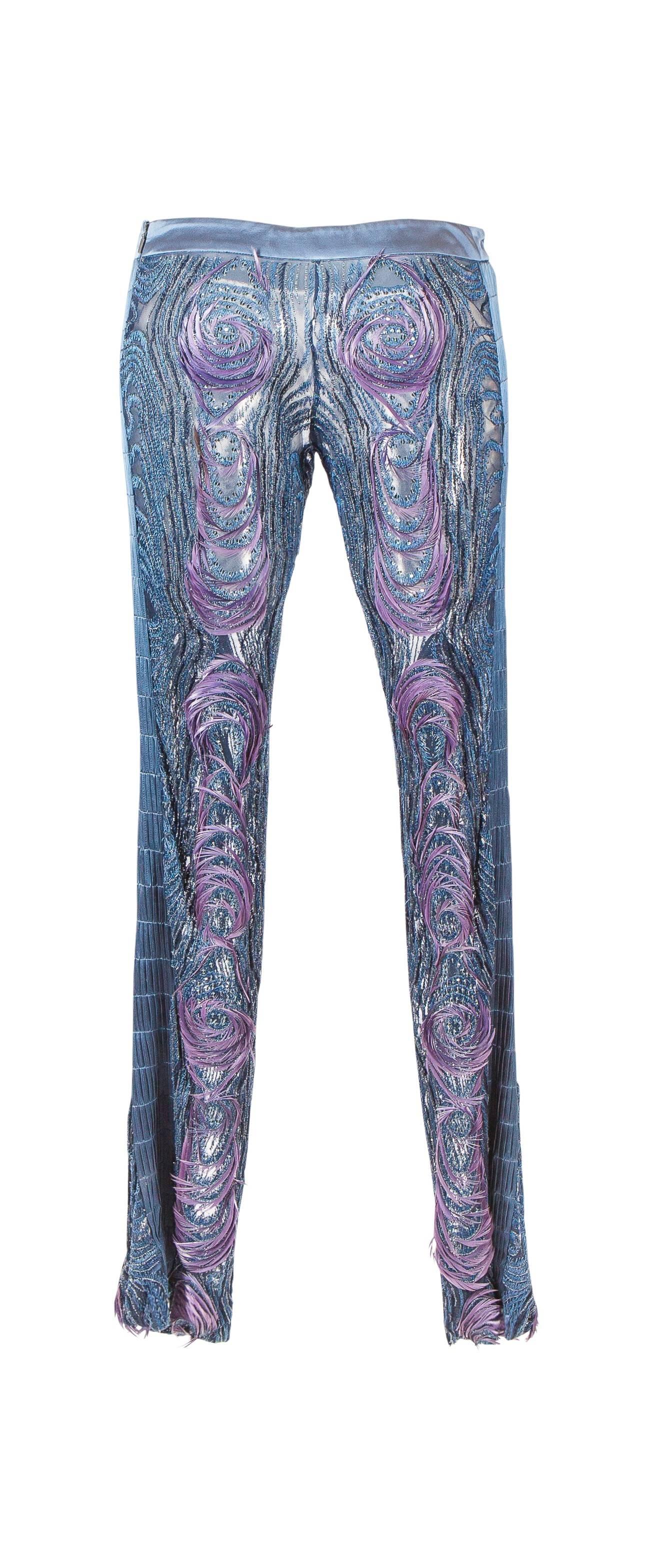Important Tom Ford For Gucci blue and purple beaded and embroidered silk mesh pants, with feather embellishment from 2003.

Marked an Italian size 38.

Manufacturer - Zamasport S.p.a.

Please contact our stylists for additional information.