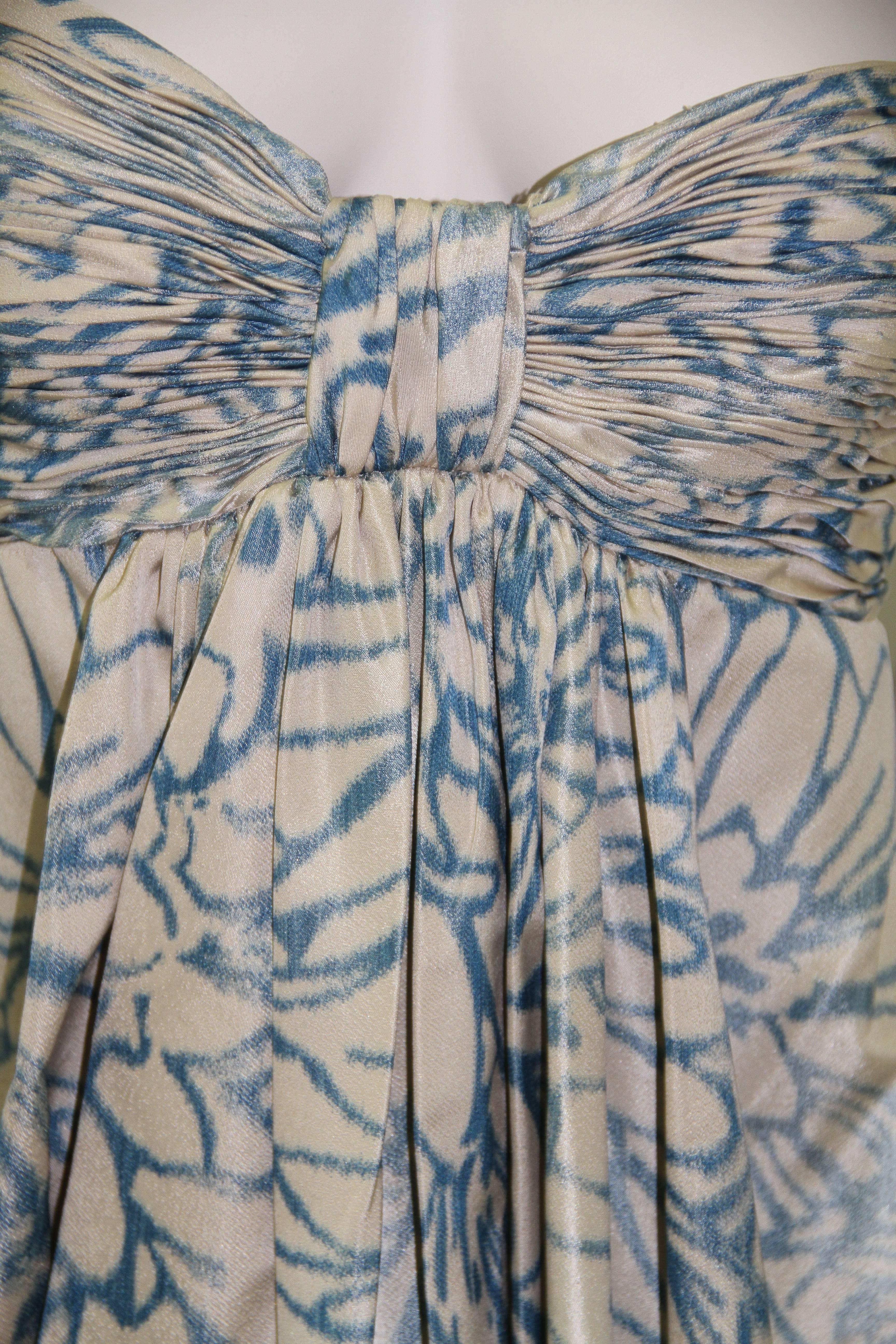 Oscar de la Renta printed silk bubble hem cocktail dress from the early 1990's.

Marked a US size 8.

Fabric content - 100% silk