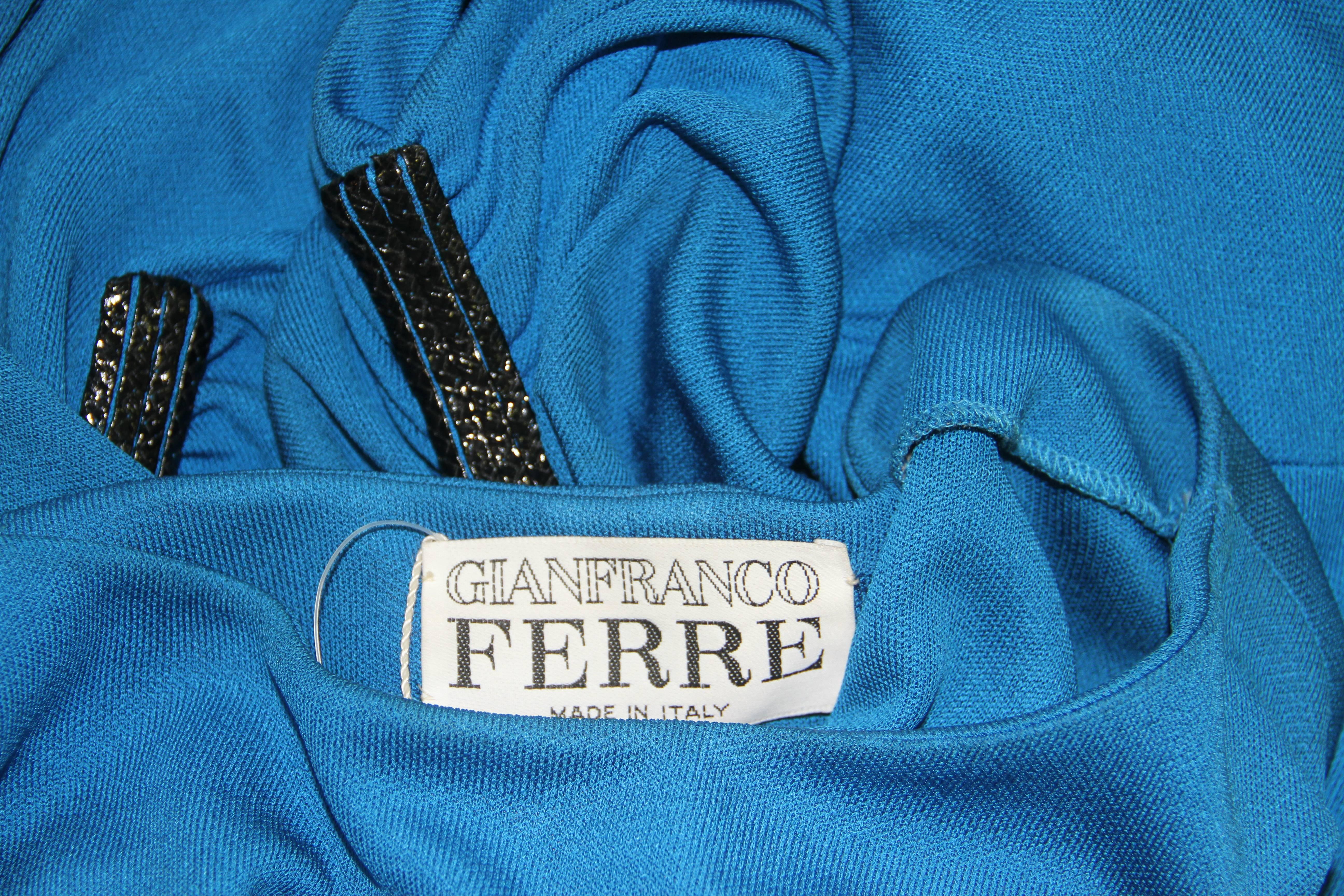 Gianfranco Ferre electric blue silk blend ruched cocktail dress, with sequin detailing from the early 1990's.

The dress is new with the original tags.

Marked an Italian size 42.

Manufacturer - Dei Mattioli S.p.a.