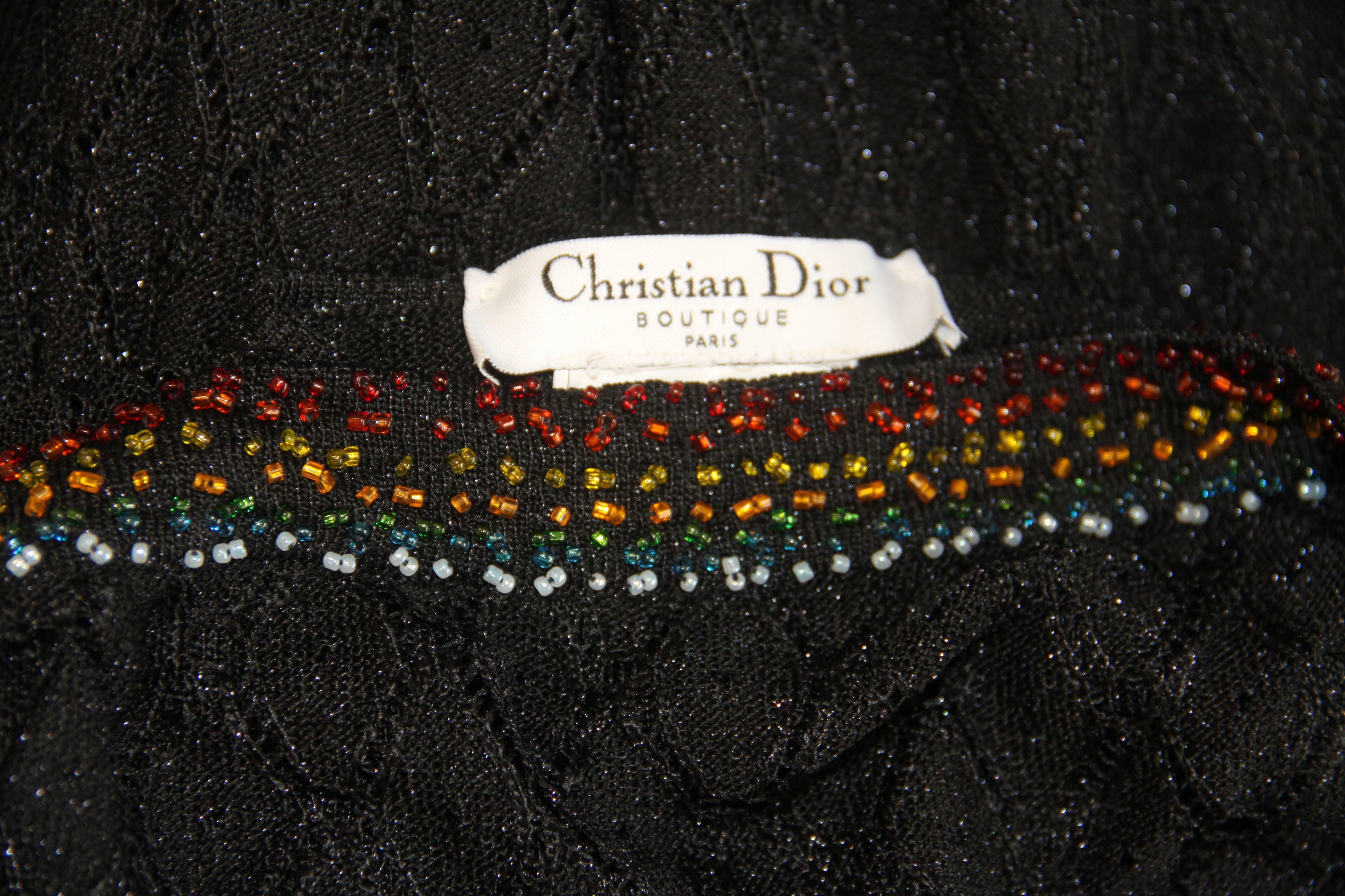 A John Galliano For Christian Dior black lurex knit beaded evening gown from the Fall 2001 collection.

Marked a French size 36.

Fabric content - 78% acetate / 12% polyester / 10% nylon