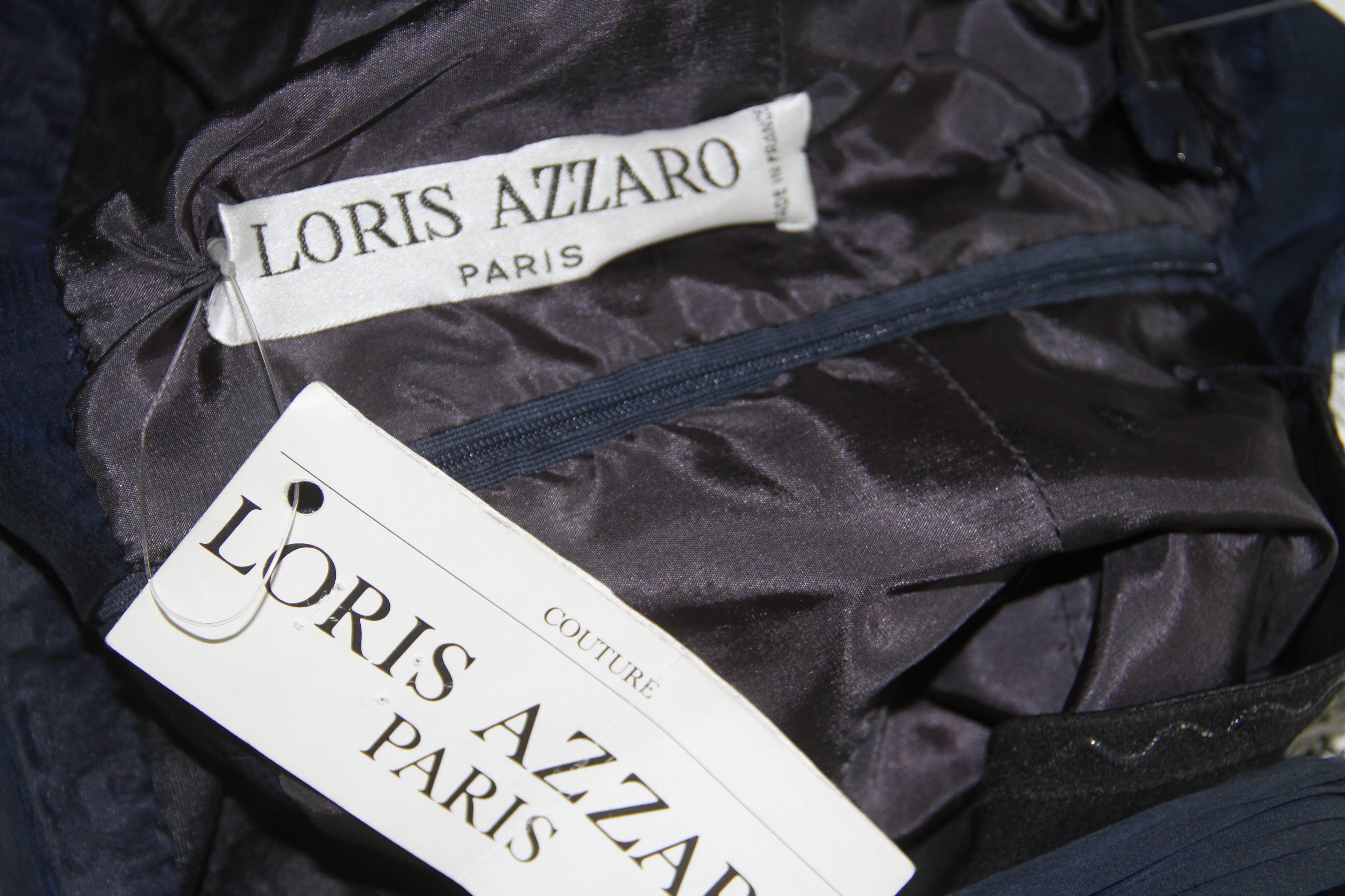 Loris Azzaro midnight blue silk chiffon cocktail dress from the 1990's.

The dress is new with the original tags.

Marked a French size 36.