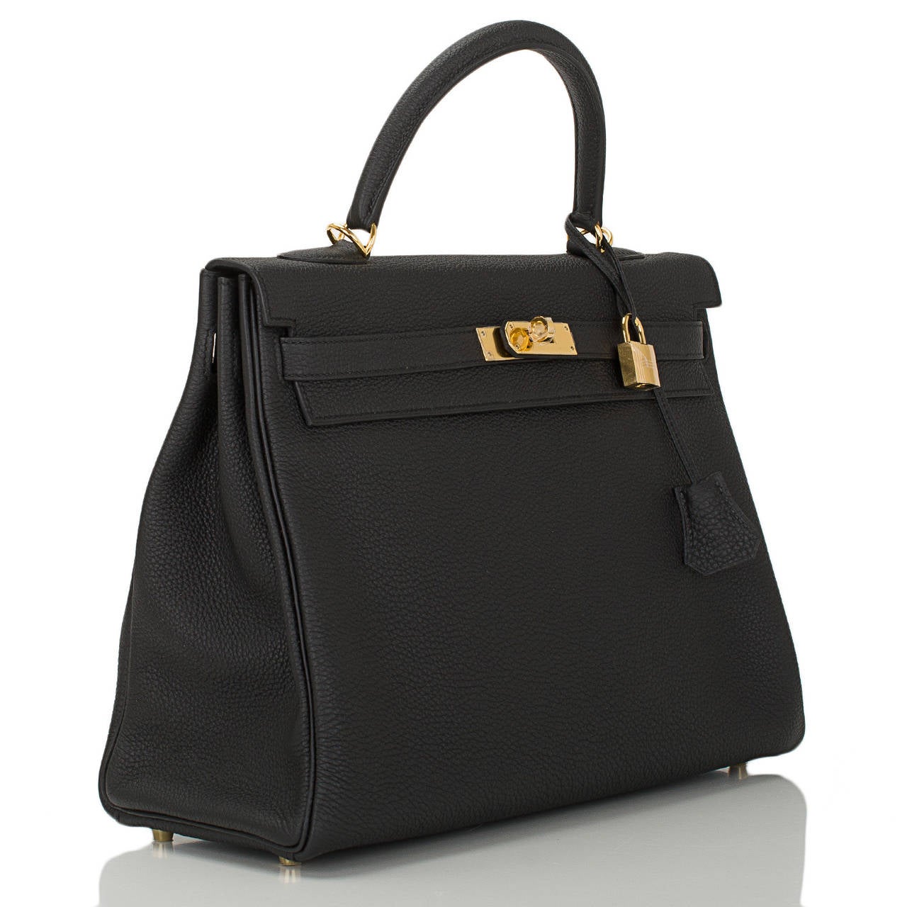 Hermes Black Kelly 35cm in rich togo (bull) leather with gold hardware.

The Hermes Kelly bag, like its sister bag -- the Birkin -- is a coveted and scarce bag. Like its muse, Grace Kelly, this bag is the definition of timeless elegance. The
