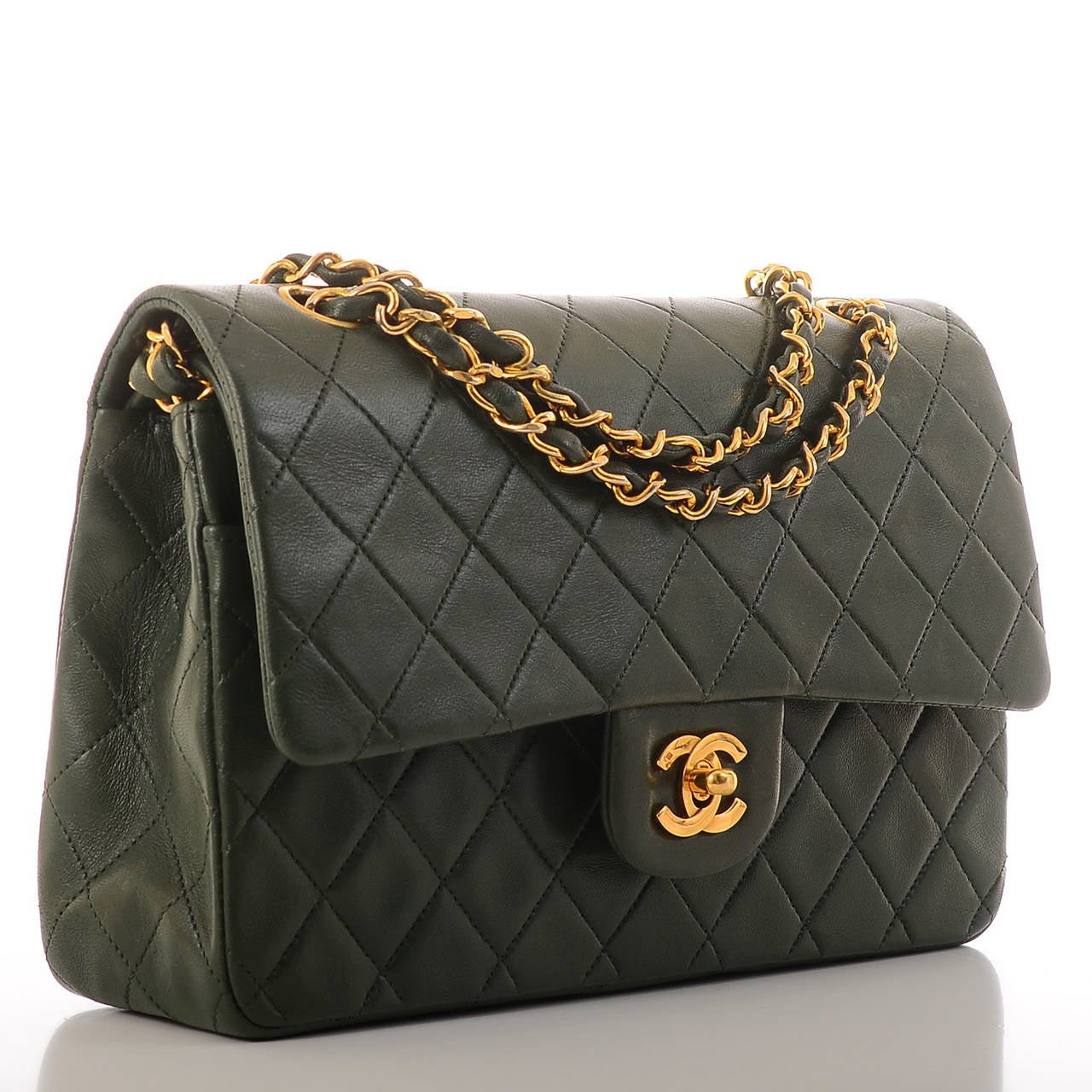 Chanel forest green Large Classic 2.55 double flap bag of quilted lambskin leather with gold tone hardware.

Named 2.55 to honor the bag's creation in February 1955, the iconic Chanel bag was a modification of the bag Coco Chanel originally
