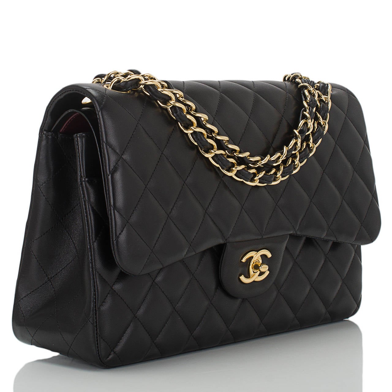 This Jumbo Classic double flap bag of black quilted lambskin leather is considered one the most coveted classic Chanel bags by many Chanel lovers. It features a front flap with signature CC turnlock closure, half moon back pocket, and an adjustable