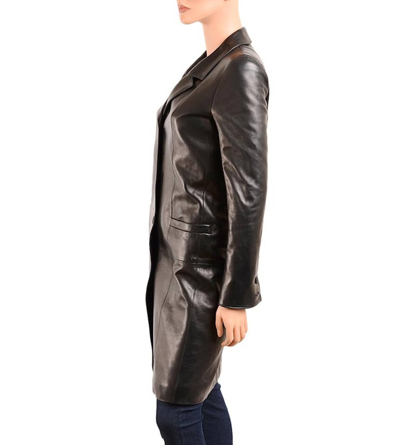 Chanel timeless lambskin leather coat with notched collar with lapels, four black CC sunburst button closure, two patch pockets, panel detail, long sleeves with two buttons one each cuff and black matelasse quilted silk lining.

Collection: