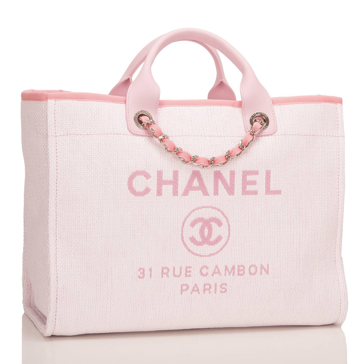 Chanel large Deauville shopping tote 30cm of pink canvas with silver tone hardware.

This bag features Chanel logos and the street name of Chanel's famous flagship store, 