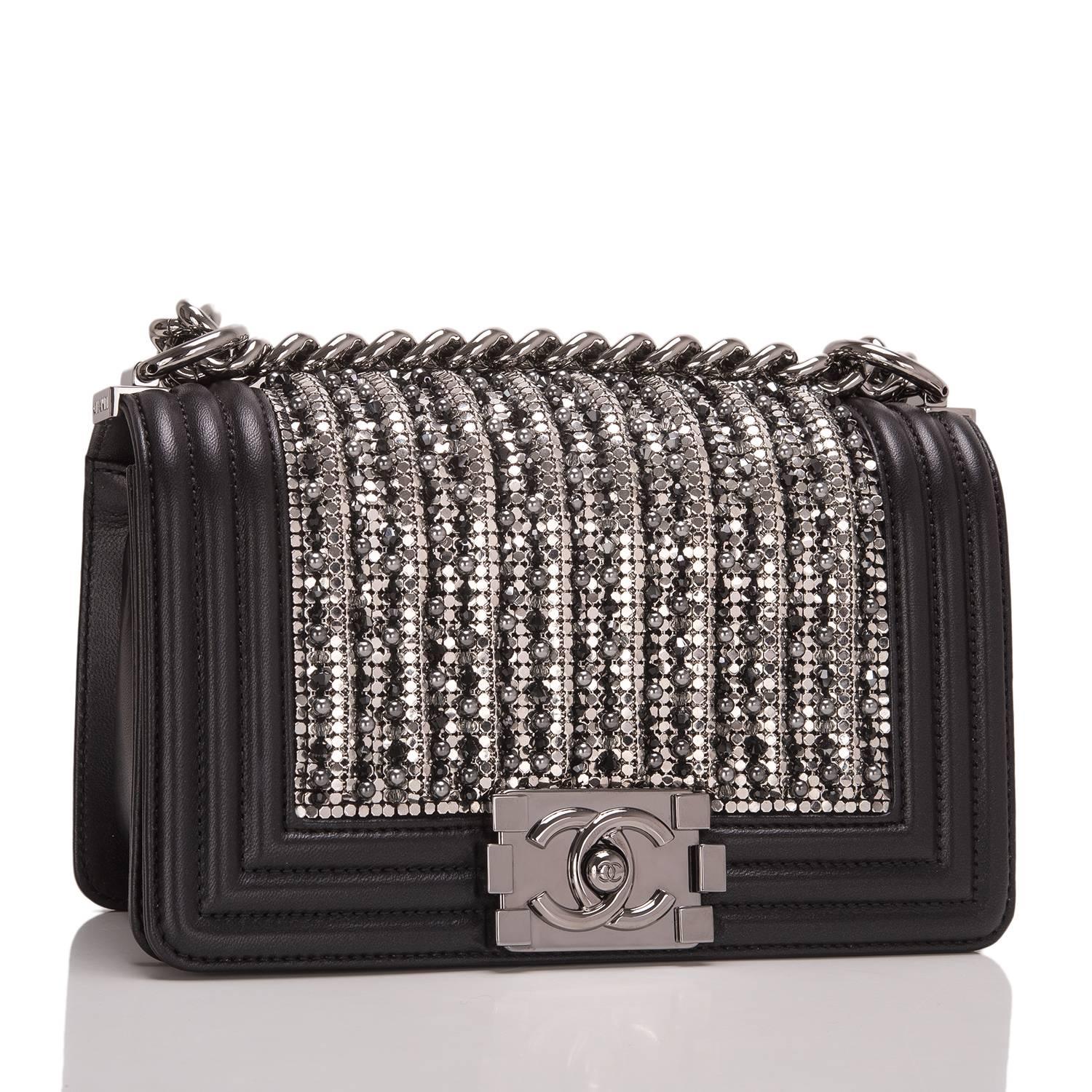 Chanel limited edition Small Boy bag of black lambskin leather with ruthenium hardware.

This rare, collectible bag features a front flap with Le Boy CC push lock closure, metallic glass and pearl embroideries in black and silver, and a ruthenium