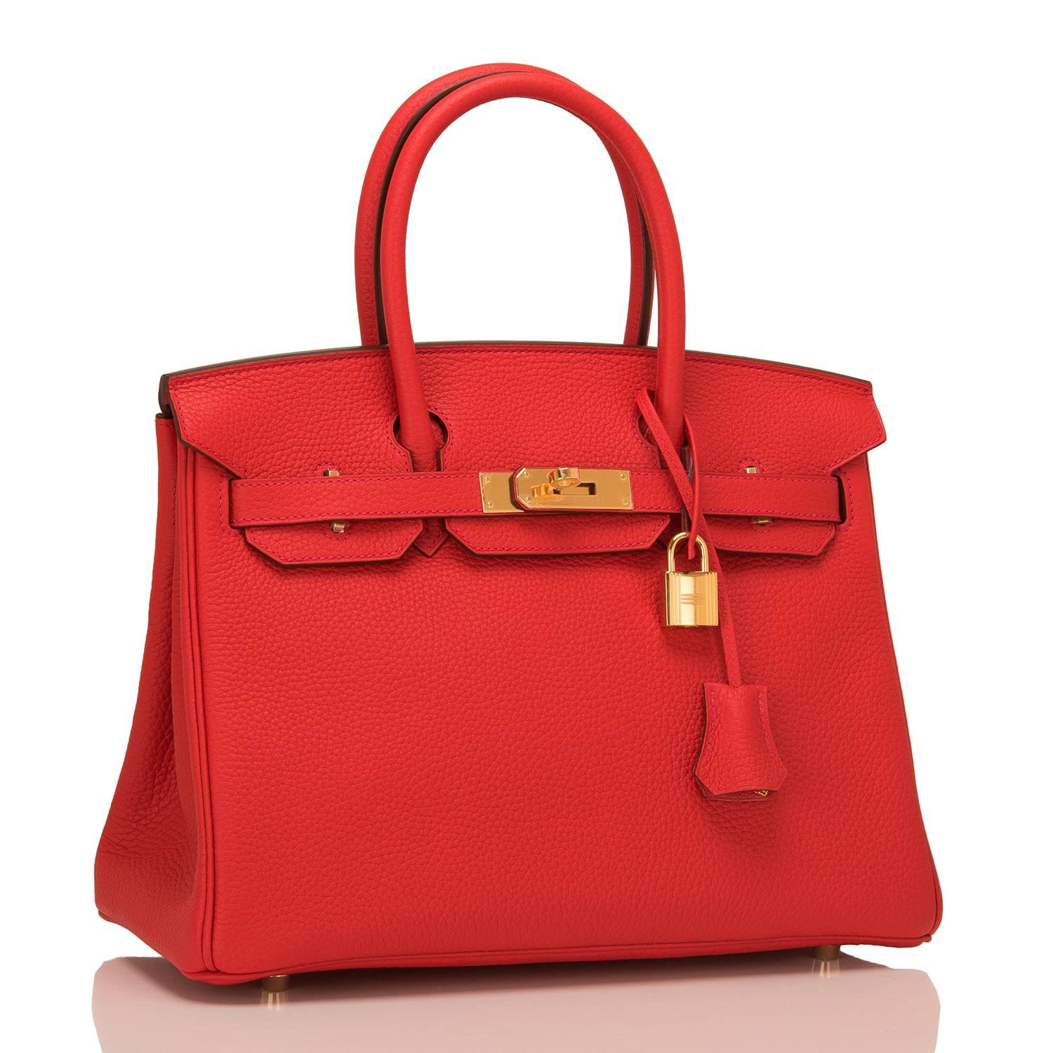 Hermes Birkin 30cm of Rouge Tomate of clemence leather with gold hardware.

This Birkin features tonal stitching, a front toggle closure, a clochette with lock and two keys, and double rolled handles.

The interior is lined with Rouge Tomate
