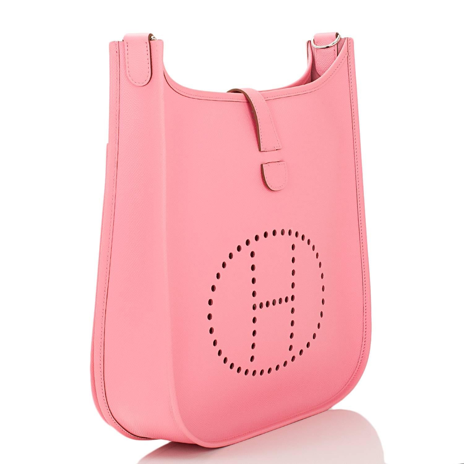 Hermes Rose Confetti Evelyne III GM of epsom leather with palladium hardware.

This Evelyne III has tonal stitching, a large perforated H icon in circle at front, a rear pocket, a pull tab top closure that has a snap closure at the rear, and a