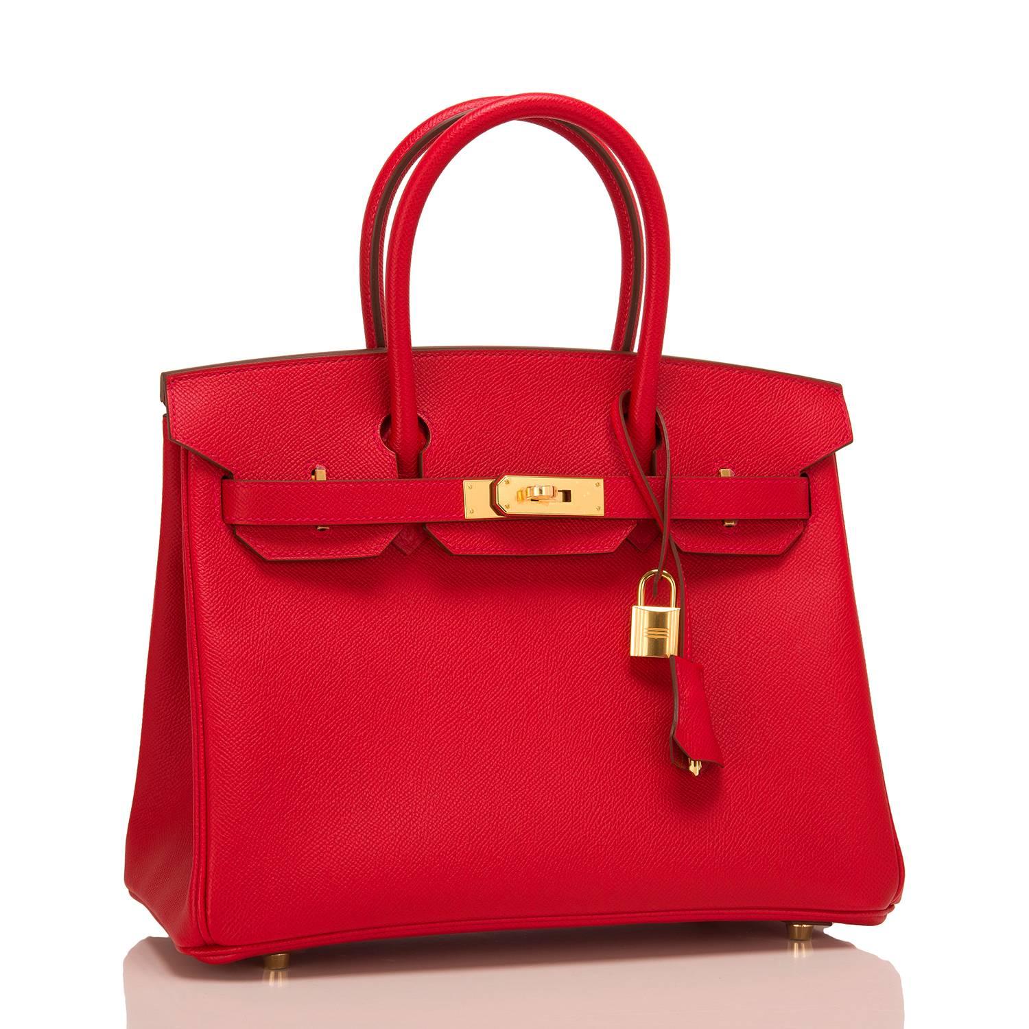Hermes Rouge Casaque Birkin 30cm of epsom leather with gold hardware.

This Birkin has tonal stitching, a front toggle closure, a clochette with lock and two keys, and double rolled handles.

The interior is lined with Rouge Casaque chevre and