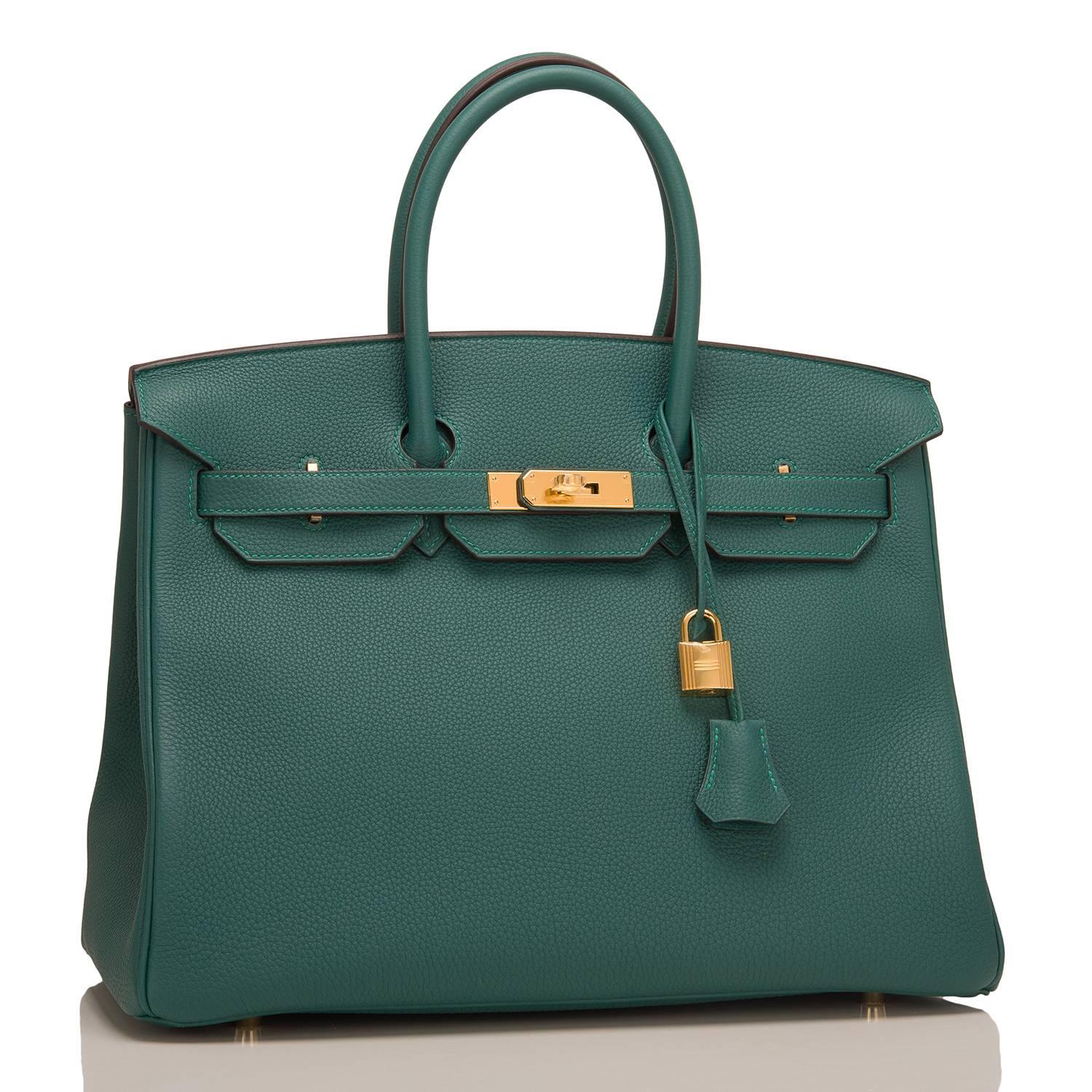 Hermes Malachite Birkin 35cm of togo leather with gold hardware.

This Birkin features tonal stitching, a front toggle closure, a clochette with lock and two keys, and double rolled handles.

The interior is lined with Malachite chevre and has a