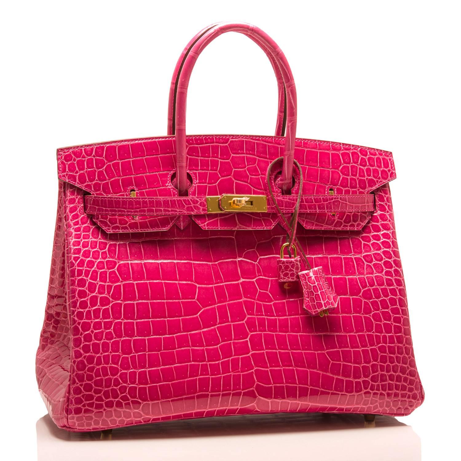 Hermes Rose Tyrien Birkin 35cm of shiny porosus crocodile leather with gold hardware.

This Birkin features tonal stitching, a front toggle closure, a clochette with lock and two keys, and double rolled handles.

The interior is lined with Rose