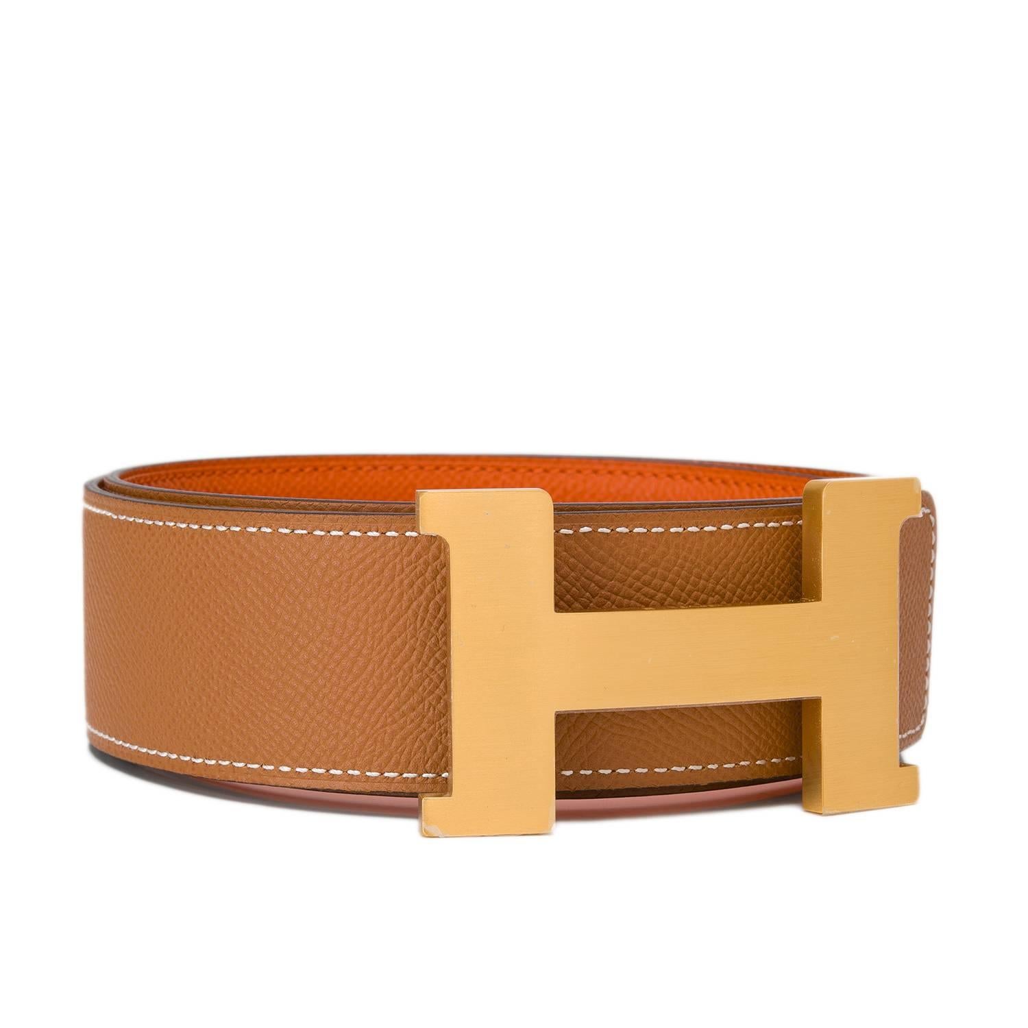Hermes belt kit comprising an adjustable wide 42mm Constance H belt of Orange epsom with tonal stitching reversing to Gold calfskin with tonal stitching accompanied by a removable brushed gold H buckle.

Origin: France

Condition: Pristine,