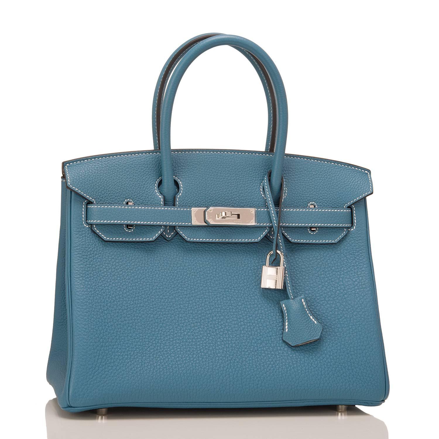 Hermes Horseshoe Stamped Birkin 30cm of Blue Jean and Gris Perle in togo leather with palladium hardware.

This Special Order Birkin has white contrast stitching, palladium hardware, double rolled handles, front toggle closure, clochette with lock