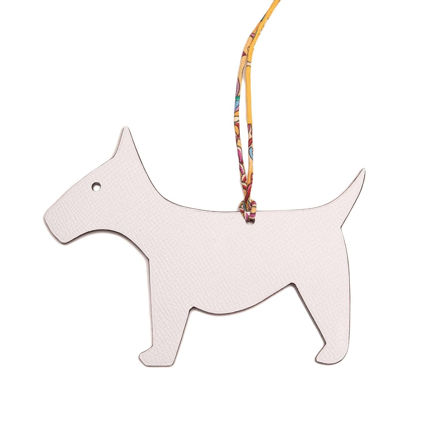 Hermes bi-color Rouge H reversible to White Petit H Dog Charm in togo leather with multicolor silk twill strap.

Collection: Petit H

Origin: France

Condition: Pristine, never used. 

Accompanied by: Hermes box, carebook, Hermes ribbon with