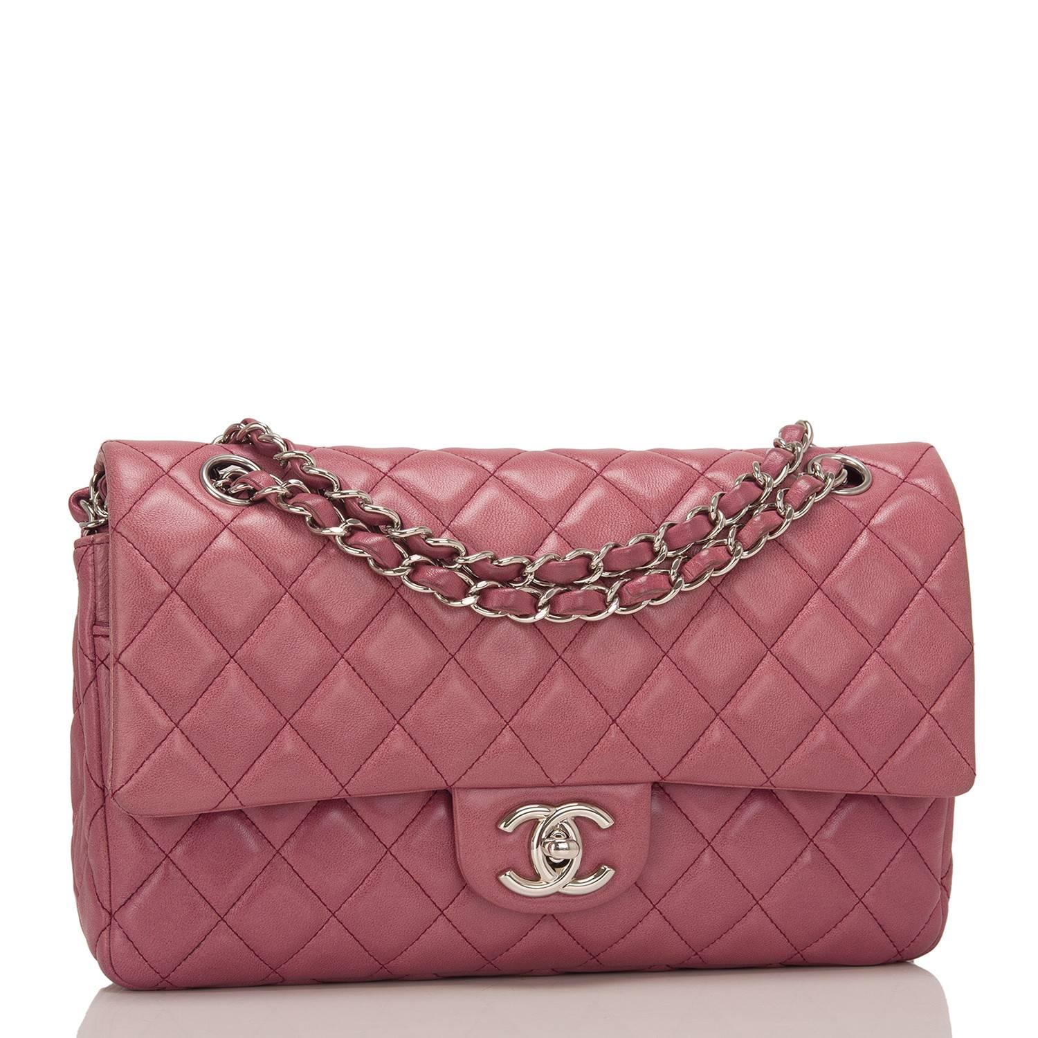 Chanel Medium Classic Double Flap bag of Rose Fonce (dark rose pink) quilted lambskin leather and silver tone hardware.

The bag features a front flap with signature CC turnlock closure, a half moon back pocket and an adjustable interwoven silver