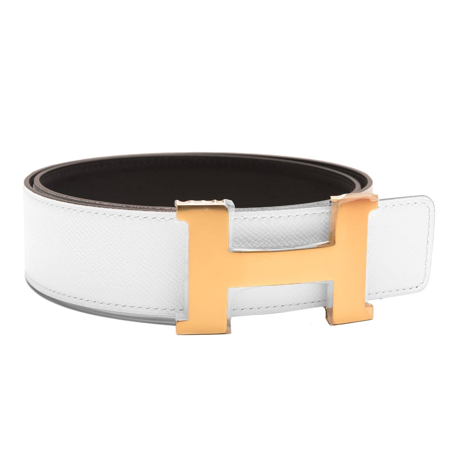 Hermes belt kit comprising an adjustable wide 42mm Constance H belt of black calfskin with tonal stitching reversing to white epsom and accompanied by a removable gold H buckle.

Origin: France

Condition: Pristine, never worn

Accompanied By: