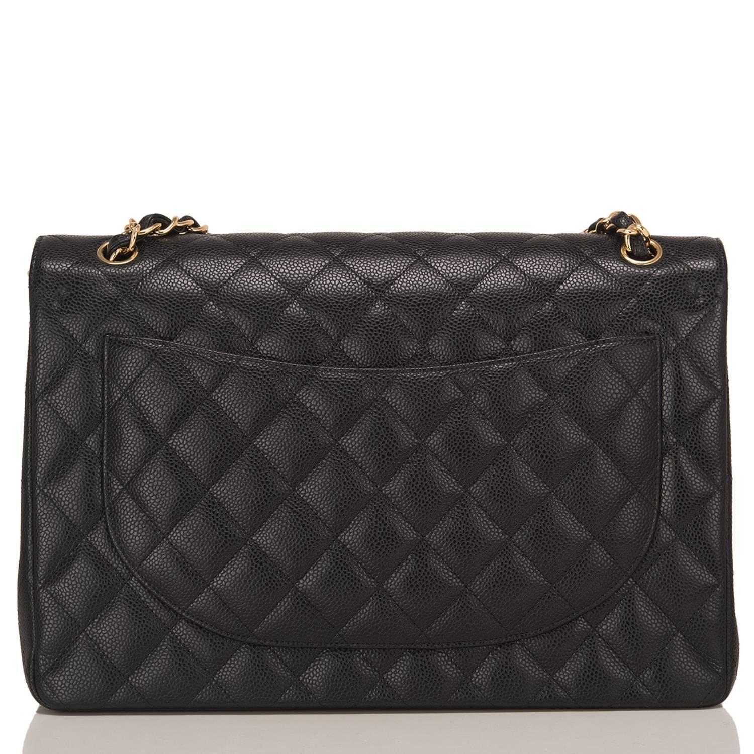 Chanel Black Quilted Caviar Maxi Classic Double Flap Bag In New Condition In New York, NY