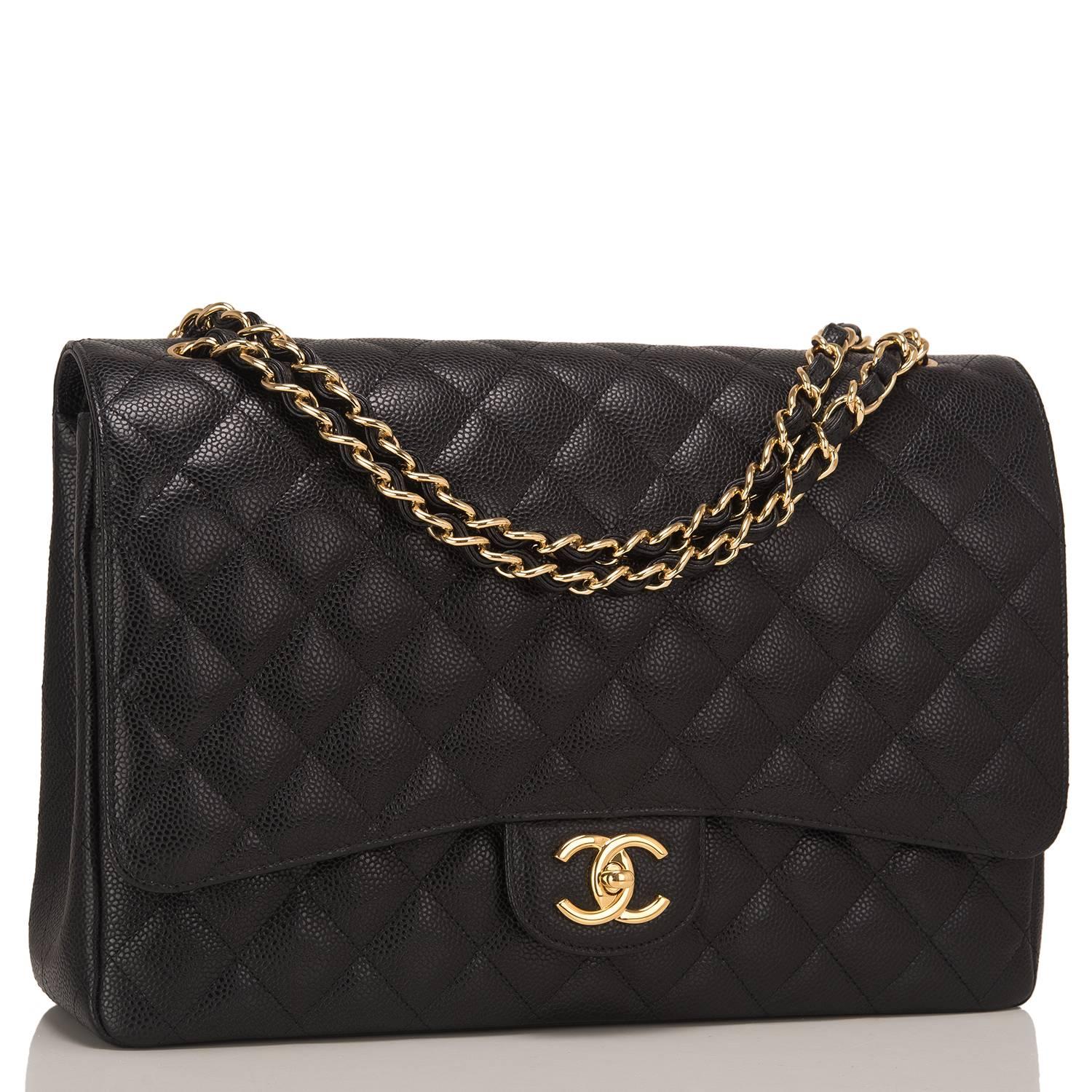 Chanel Maxi Classic Double Flap bag of black quilted caviar leather with gold hardware.

This bag features a front flap with signature CC turnlock closure, half moon back pocket, and adjustable interwoven gold tone chain link and black leather