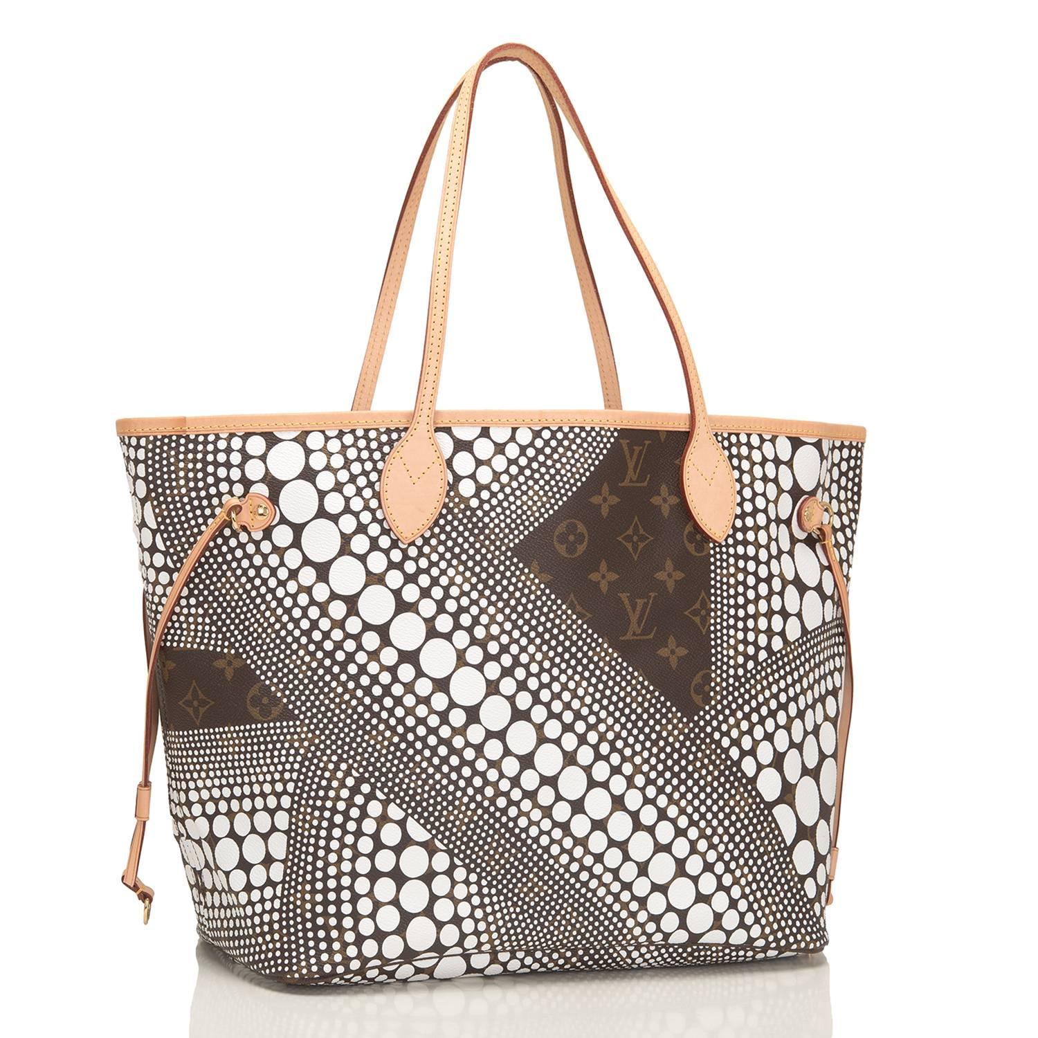 Louis Vuitton White Monogram Waves Neverfull MM tote designed by Yayoi Kusama of coated canvas.

This limited edition Neverfull has polished brass hardware, yellow contrast stitching, a removable luggage tag, a hidden top hook closure, double flat