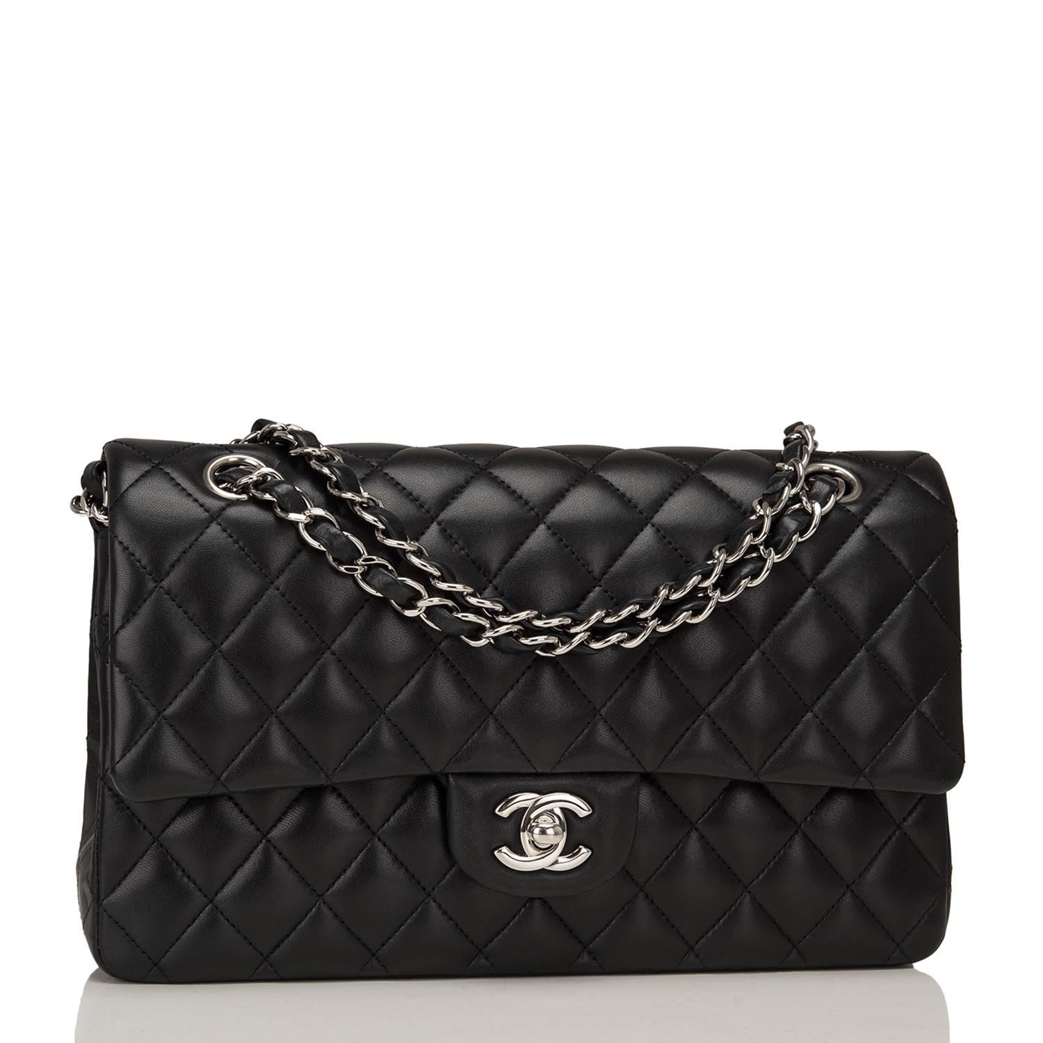 Chanel Medium Classic double flap bag of black lambskin leather with silver tone hardware.

This bag features a front flap with signature CC turnlock closure, a half moon back pocket, and an adjustable interwoven silver tone chain link with black