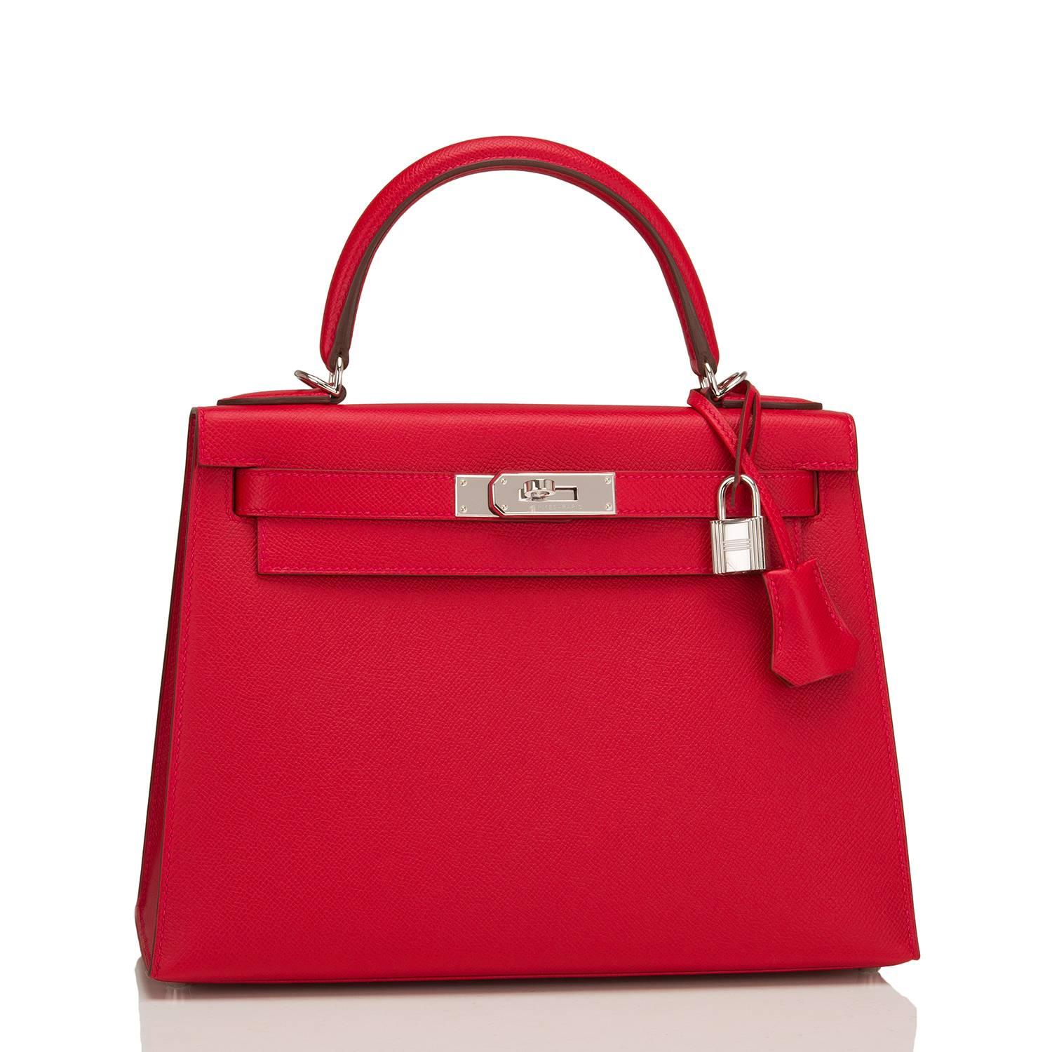 Hermes Rouge Casaque Sellier Kelly 28cm of epsom leather with palladium hardware.

This Kelly Sellier has tonal stitching, a front toggle closure, a clochette with lock and two keys, a single rolled handle and an optional shoulder strap.

The