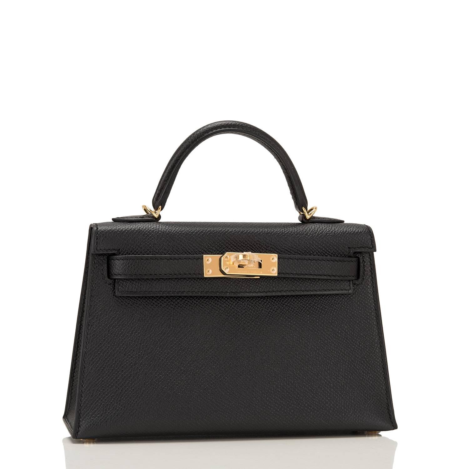 Hermes Black Sellier Kelly 20cm of epsom leather with gold hardware.

This limited edition Kelly has tonal stitching, a front toggle closure, a single rolled handle and an optional shoulder strap.

The interior is lined with black chevre leather and