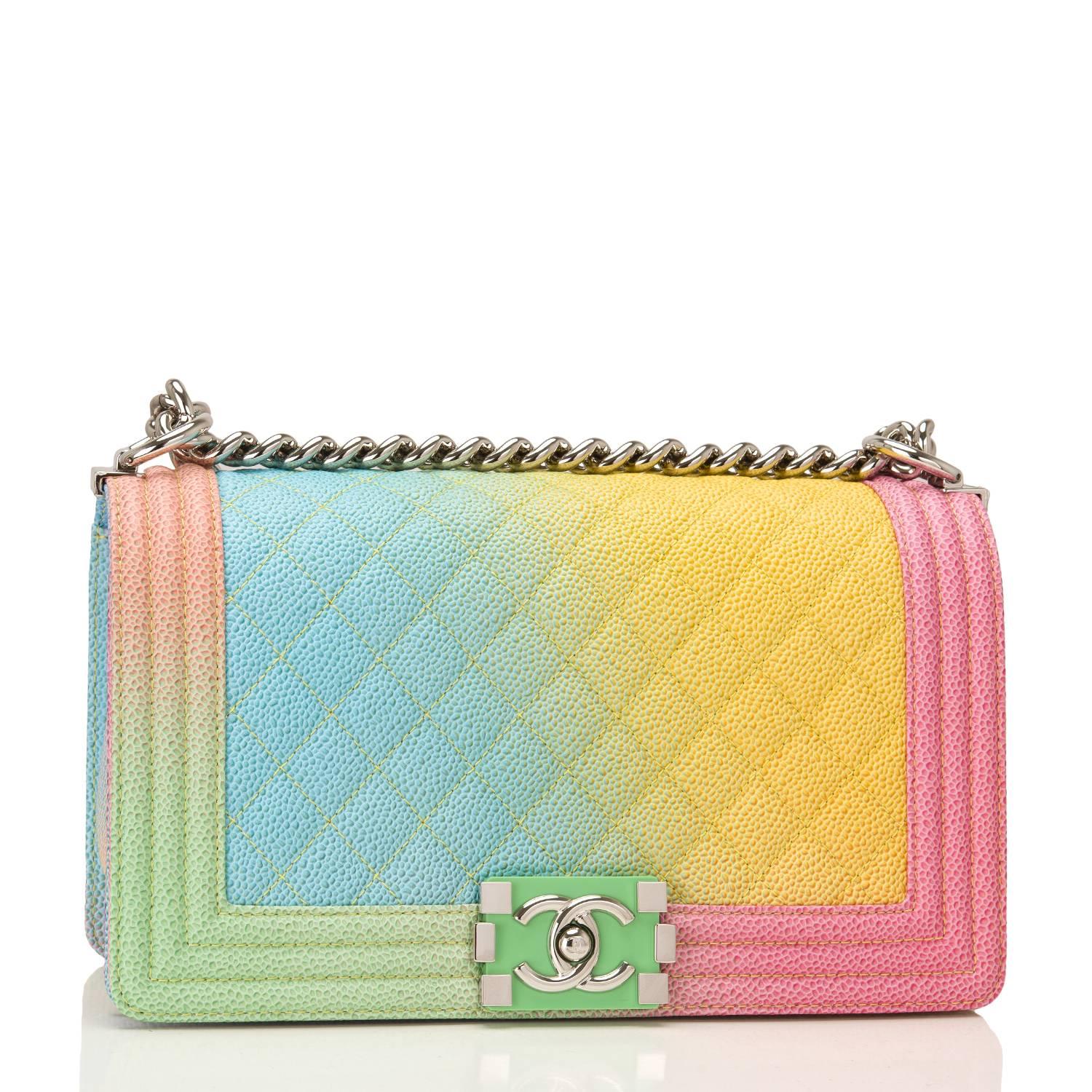 Chanel Old Medium Boy bag of rainbow printed caviar leather with silver tone hardware.

This limited edition bag from the Cuba collection features a full front flap with the Le Boy CC push lock closure of green resin and silver tone hardware and a