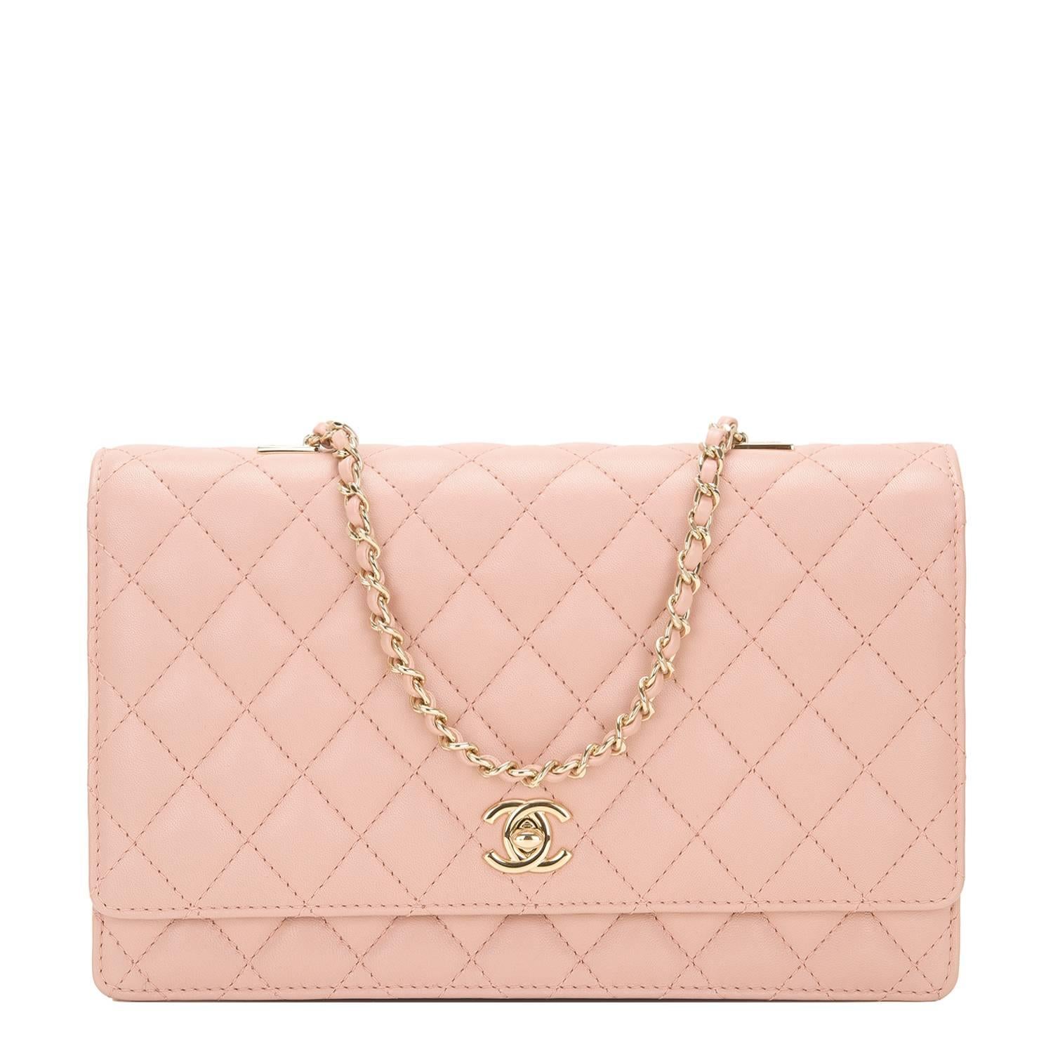 Chanel Fantasy Pearls Large Evening Flap bag of nude (blush pink) quilted lambskin, faux pearls and gold tone hardware.

This limited edition bag features a front flap with signature CC turnlock closure, nude pink leather and gold tone hardware