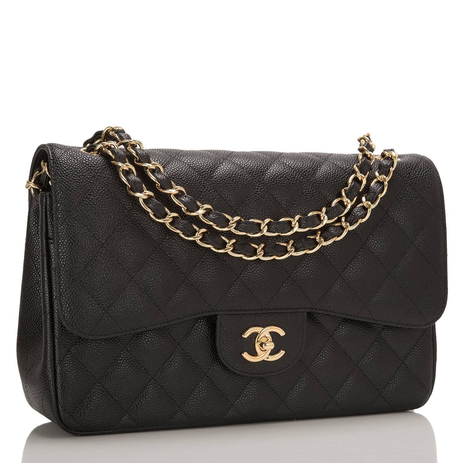 Chanel Jumbo Classic double flap bag of black quilted caviar leather with gold tone hardware.

This bag features a front flap with signature CC turnlock closure, a half moon back pocket, and an adjustable interwoven gold tone chain link with black
