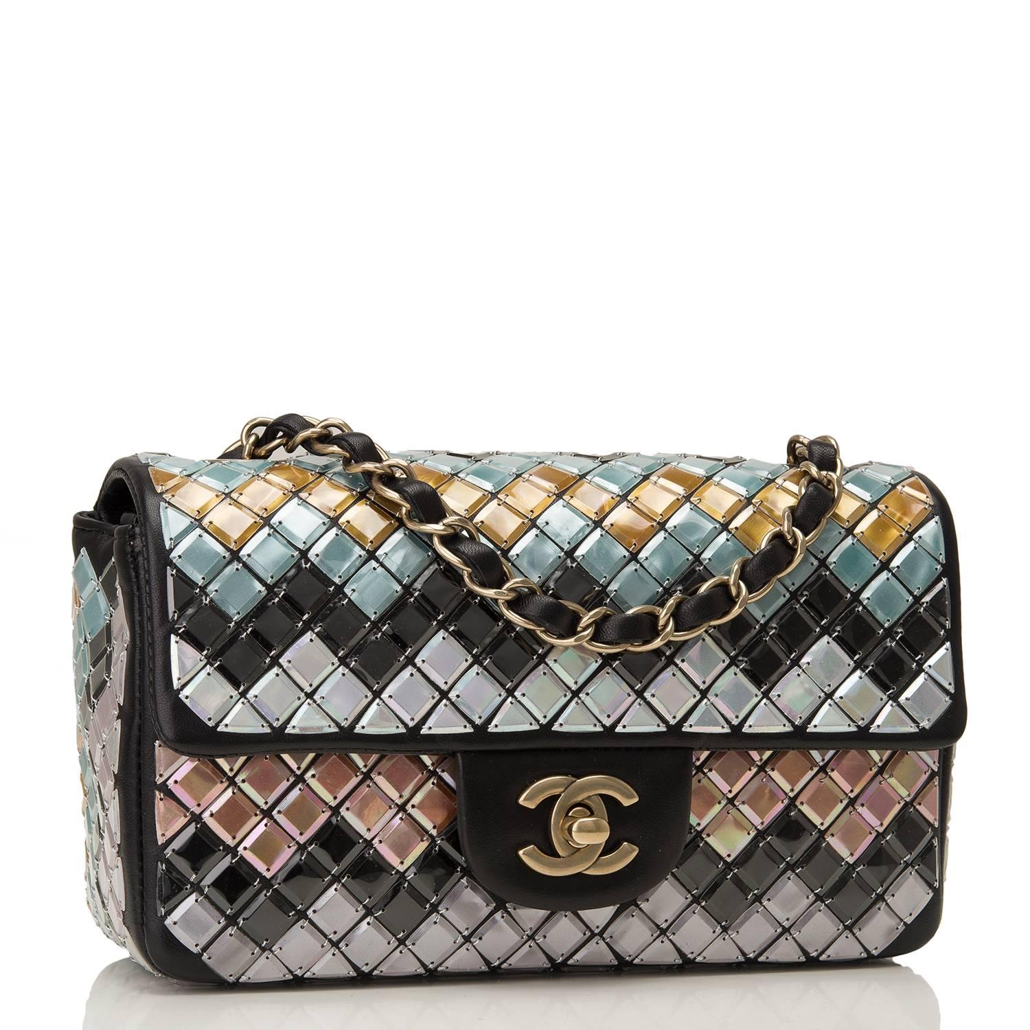 Chanel Mosaic Embroideried Small Flap bag of black lambskin leather with antique gold tone hardware.

This collectible bag from the Brassiere Gabrielle Collection features multicolor mosaic tiles embroidered on the bag by Lesage in an allover