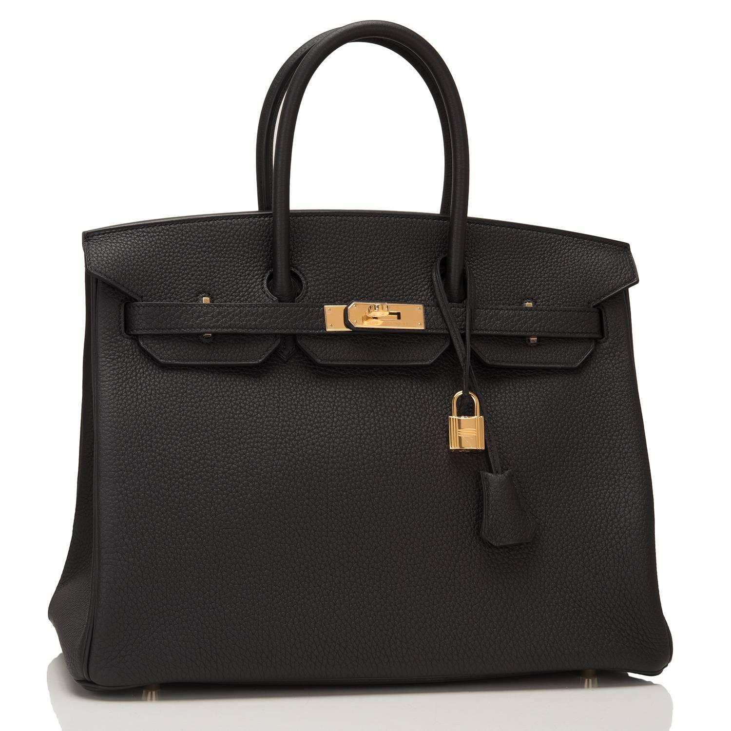 Hermes Black Birkin 35cm of togo leather with gold hardware.

This Birkin features tonal stitching, a front toggle closure, a clochette with lock and two keys, and double rolled handles.

The interior is lined with black chevre and has one zip