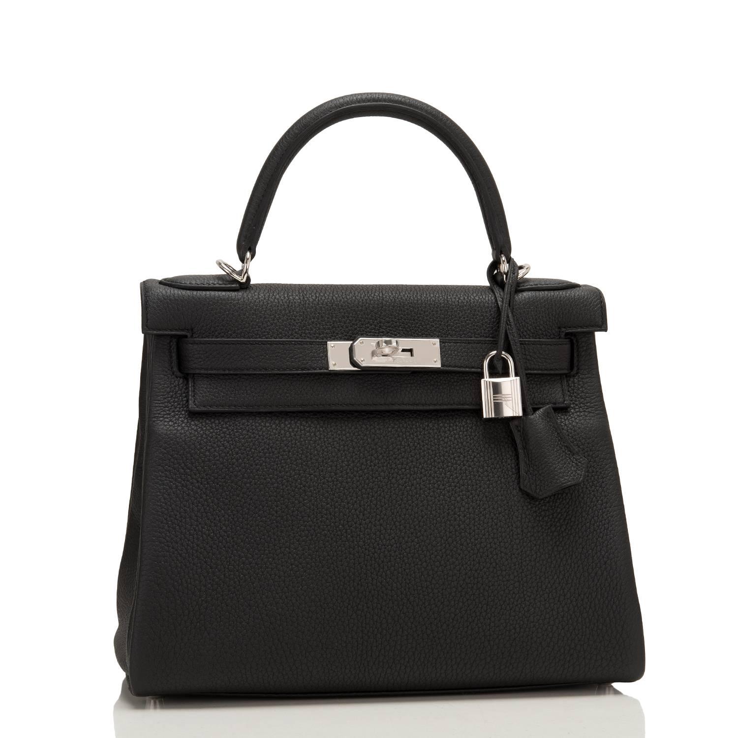 Hermes Black Kelly 28cm of togo leather with palladium hardware.

This Kelly, in the Retourne style, has tonal stitching, a front toggle closure, a clochette with lock and two keys, a single rolled handle, and a removable shoulder strap.

The