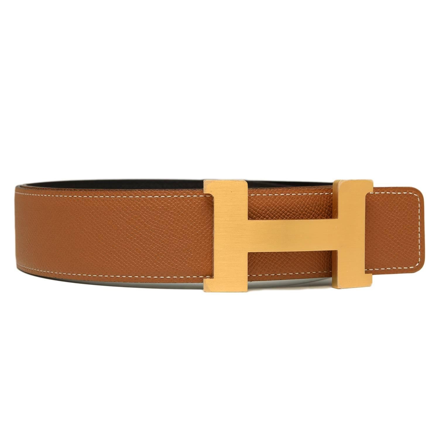Hermes belt kit comprising an adjustable wide 42mm Constance H belt of Black epsom with tonal stitching reversing to Gold epsom with white contrast stitching accompanied by a removable brushed gold H buckle.

Origin: France
 
Condition: Pristine,