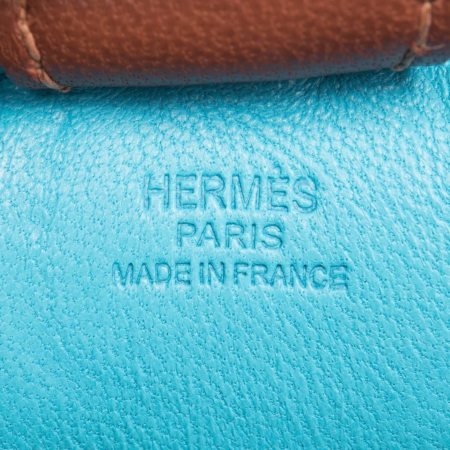Hermes Grigri Rodeo bag charm in size PM.
 
This charm is made of Blue Izmir Milo lambskin leather and accented with a Blue Electric mane and tail and a brown saddle and holder.

Origin: France
 
Condition: Never carried
 
Accompanied by: Hermes