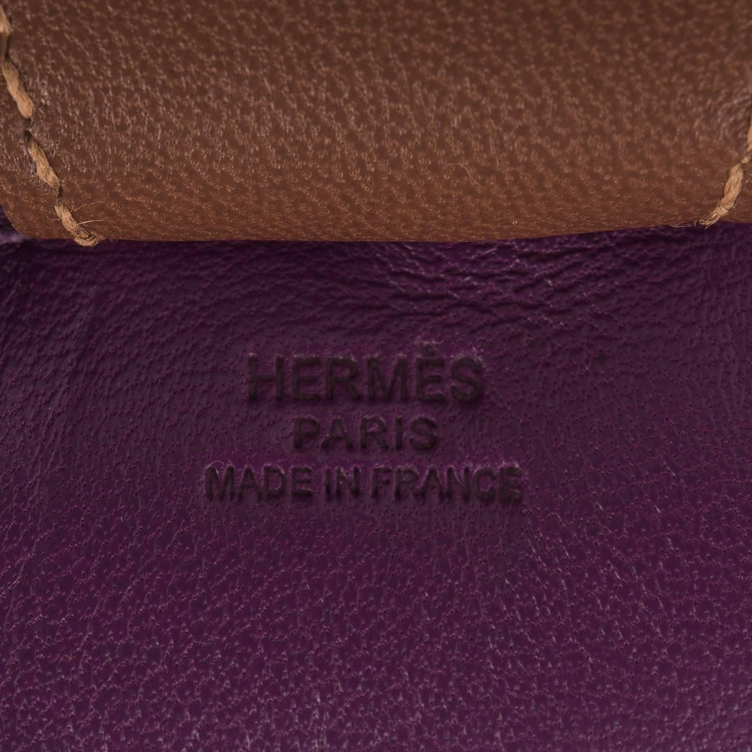 Hermes Grigri Rodeo bag charm in size MM.
 
This charm is made of Anemone Milo lambskin leather and accented with a Blue Izmir mane and tail and a Gold saddle and holder.

Origin: France

Condition: Never carried 

Accompanied by: Hermes box,