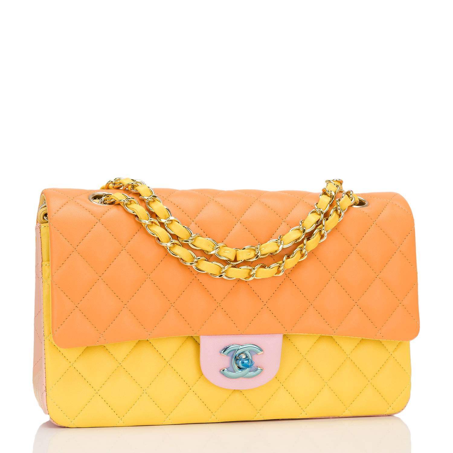 Chanel Medium Classic double flap bag of pink, yellow and orange quilted lambskin with gold tone hardware.

This limited edition bag is of classic design and features the signature CC turnlock closure, half moon rear pocket and adjustable interwoven