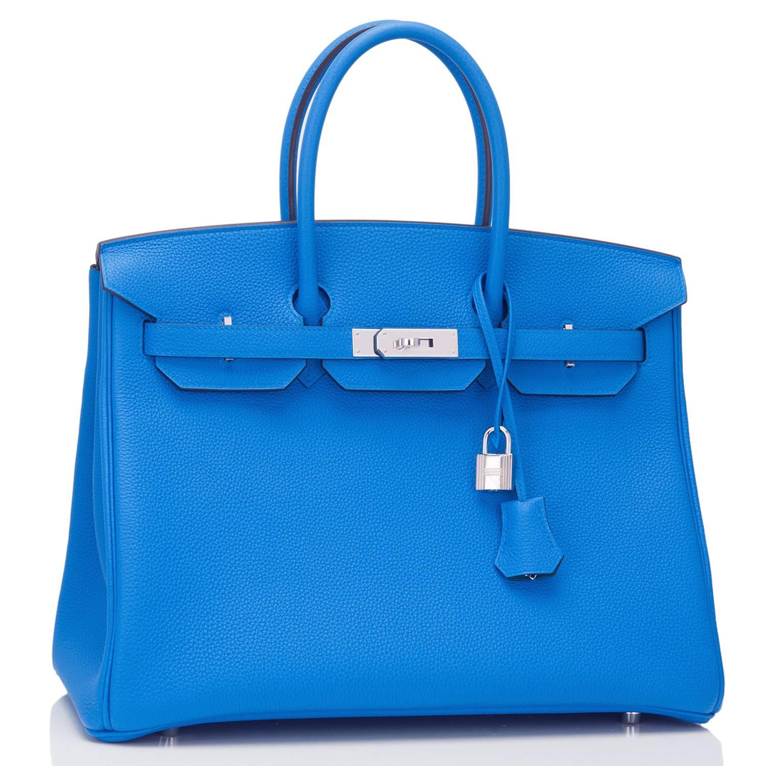 Hermes limited edition Bleu Zanzibar Verso Birkin 35cm of togo leather with Malachite lining and palladium hardware.

This Birkin has tonal stitching, a front toggle closure, a clochette with lock and two keys, and double rolled handles.

The