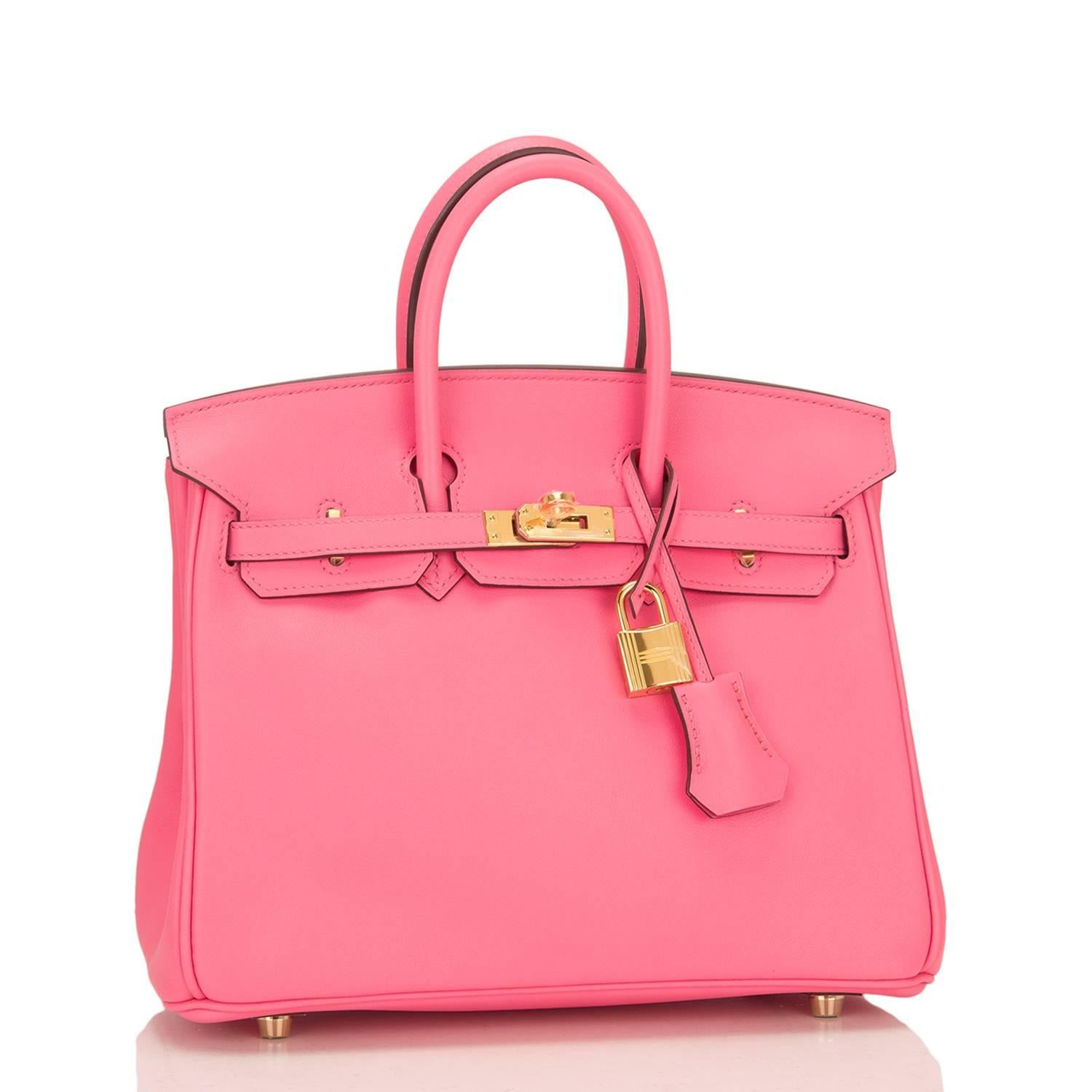 Hermes Rose Azalea (Azalee) Birkin 25cm of swift leather with gold hardware.

This Birkin has tonal stitching, a front toggle closure, a clochette with lock and two keys, and double rolled handles.

The interior is lined with Rose Azalea chevre and