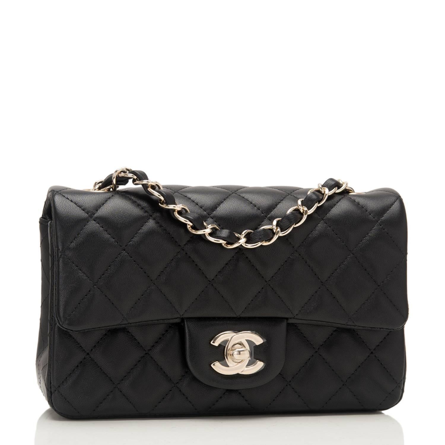Chanel Rectangular Mini Classic flap bag of black lambskin leather with gold tone hardware.

This bag has a front flap with signature CC turnlock closure, rear half moon pocket and single interwoven black leather and gold tone chain link
