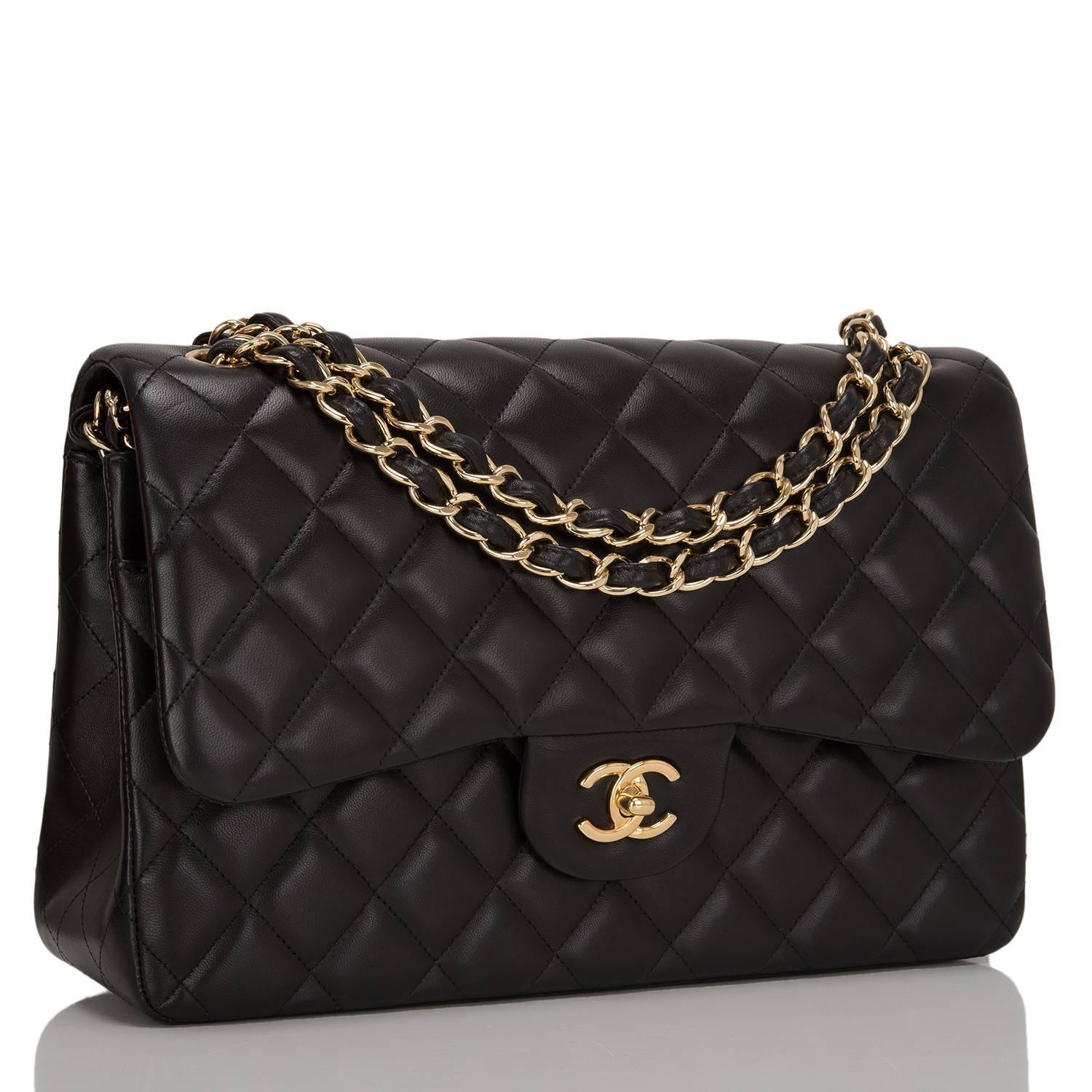 Chanel Jumbo Classic double flap bag of black lambskin leather with gold tone hardware.

This bag features a front flap with signature CC turnlock closure, a half moon back pocket, and an adjustable interwoven gold tone chain link with black leather