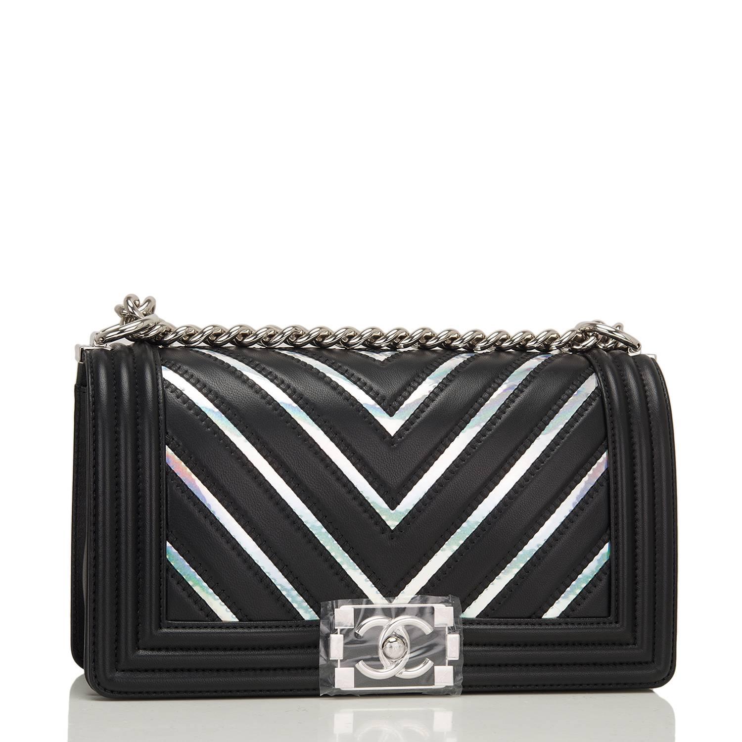 Chanel Old Medium Boy bag of black lambskin leather with multicolor iridescent PVC chevron pattern and silver tone hardware.

This limited edition Chanel bag is in the classic Boy style with unique multicolored iridescent panels front and back, a