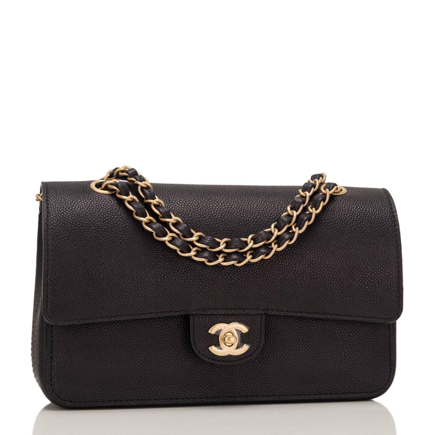 Chanel Medium Classic double flap bag of black caviar leather with gold tone hardware.

This bag features a front flap with signature CC turnlock closure, a half moon back pocket, and an adjustable interwoven gold tone chain link with black leather