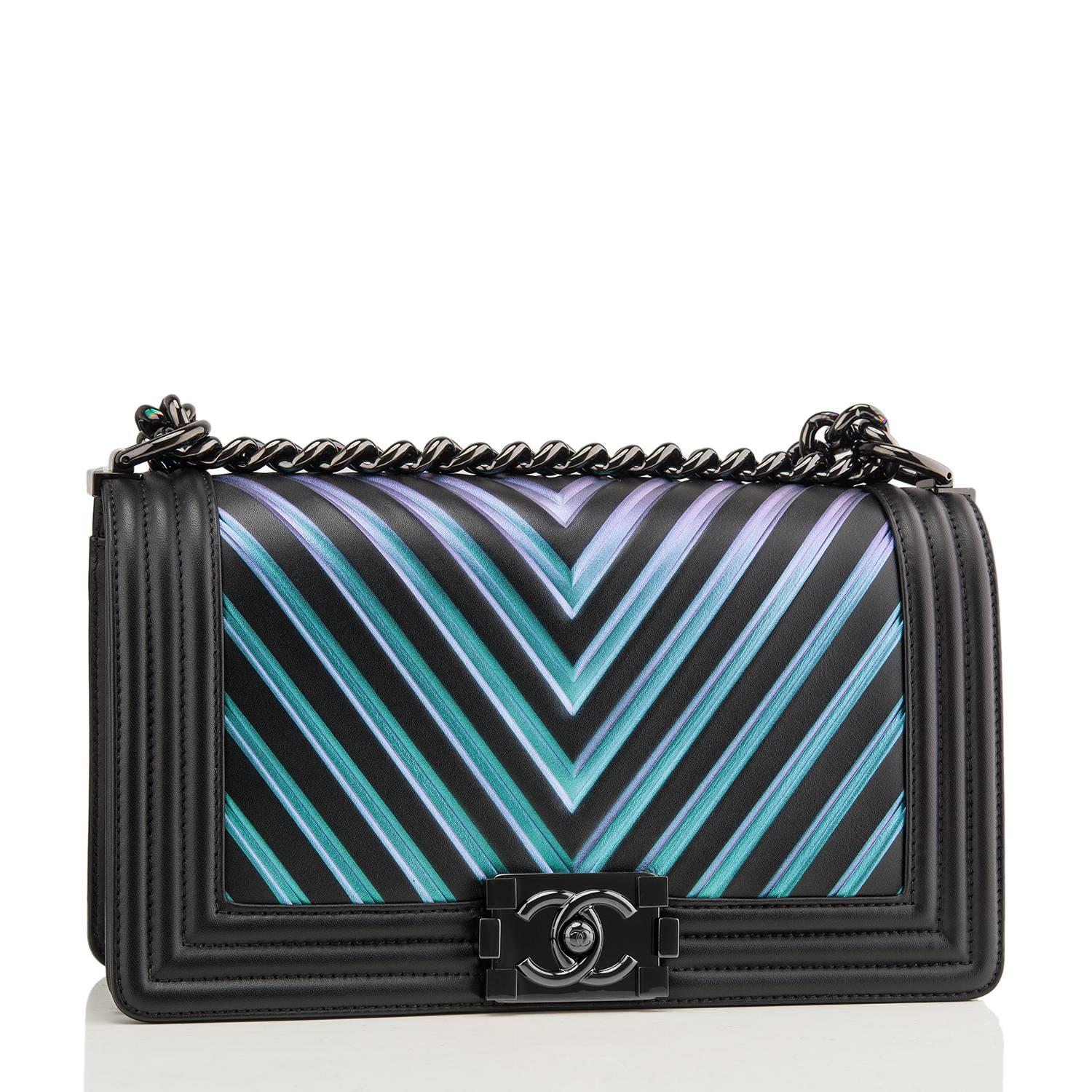 Chanel Old Medium Boy bag of black calfskin leather with multicolor iridescent painted and embossed chevron pattern and black hardware.

This limited edition Chanel bag is in the classic Boy style with unique multicolored iridescent front and back,