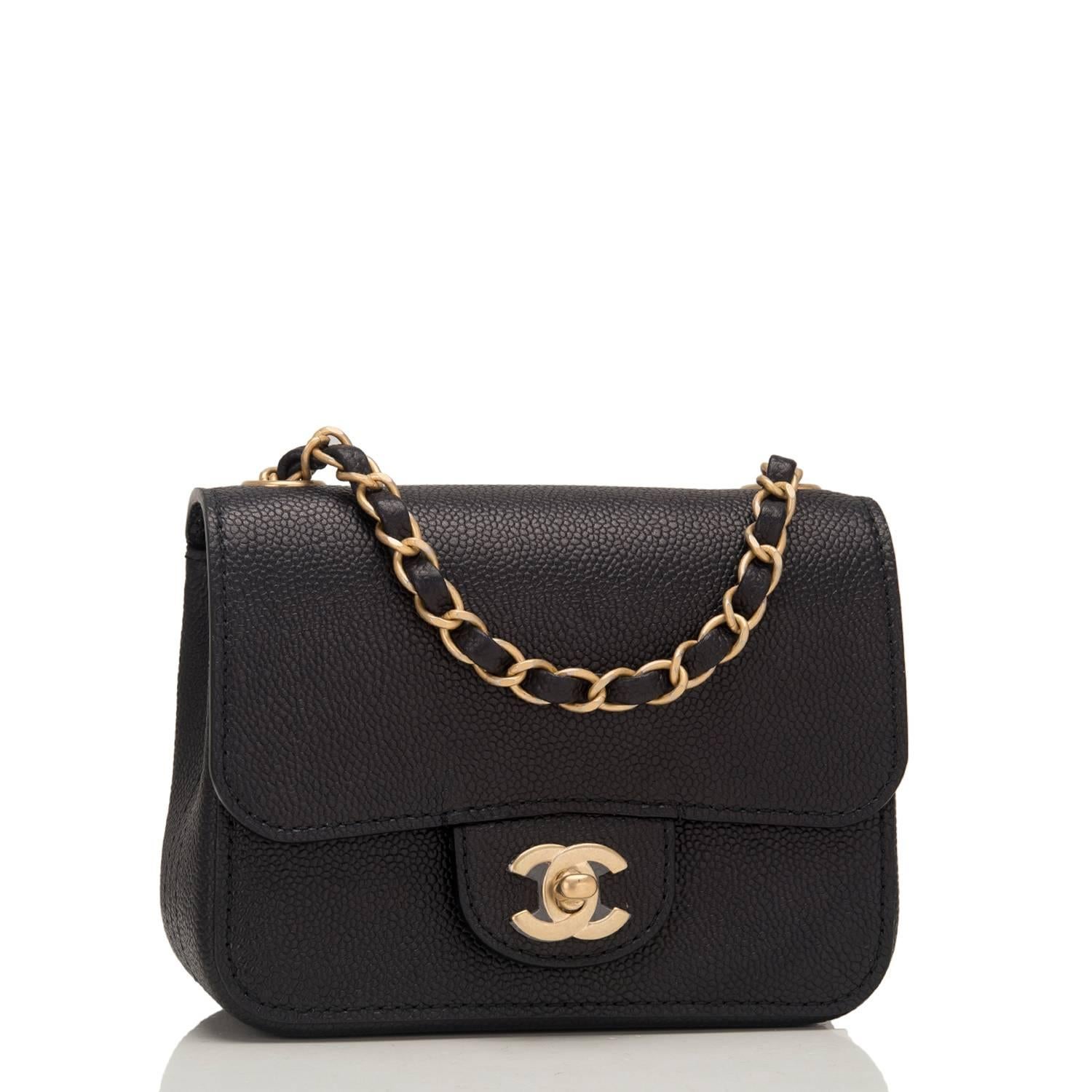 Chanel Square Mini Classic flap bag of black caviar leather with gold tone hardware.

This bag has a front flap with CC turnlock closure, a half moon back pocket, and an interwoven chain link with black leather shoulder/crossbody strap.

The
