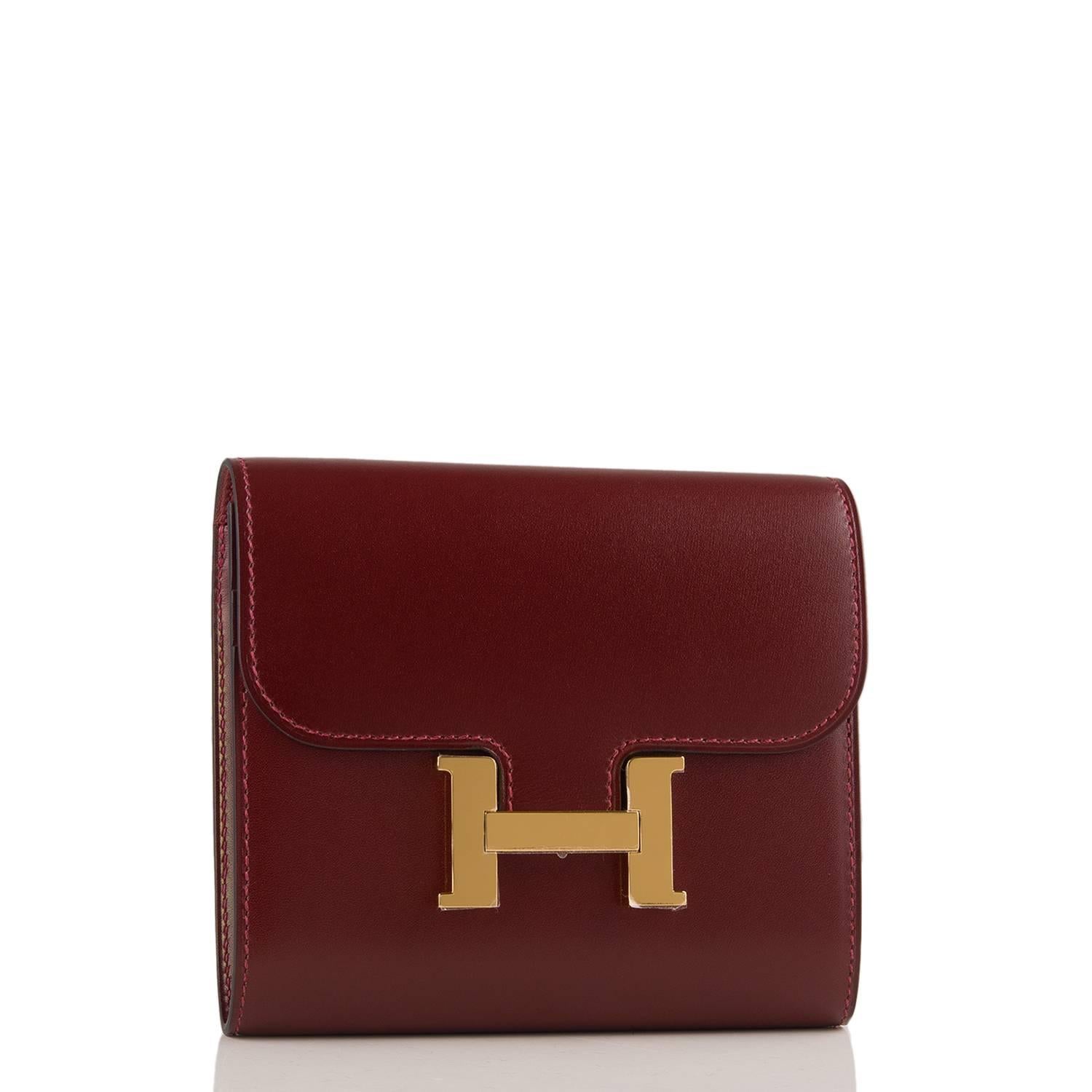Hermes Rouge H Constance Long Wallet of box leather with gold hardware.

This compact wallet has tonal stitching, a metal 