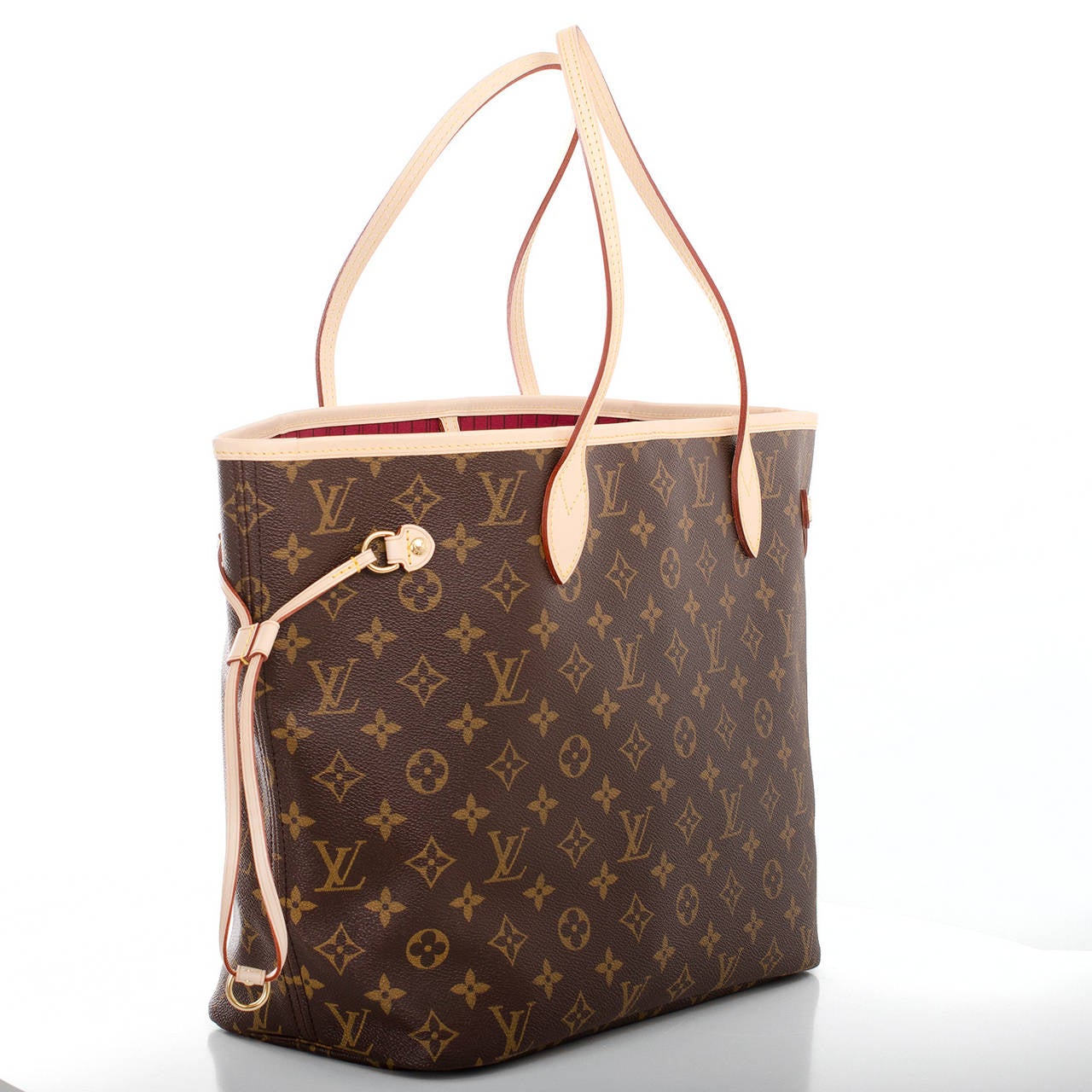 Louis Vuitton Monogram Fuchsia Neo Neverfull MM of coated canvas with vachetta leather trim.

This classic tote features polished brass hardware, detachable zipper pouch, adjustable drawstring sides, hidden top hook closure and double flat