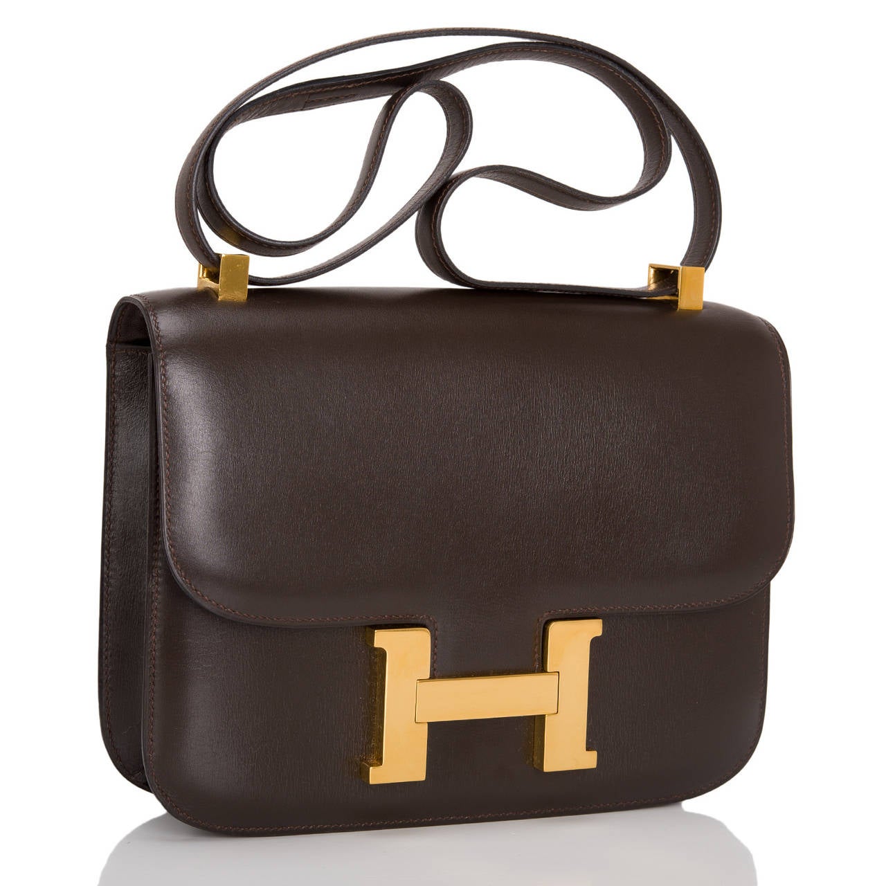 Hermes Chocolate box leather Constance 23cm with gold hardware.

This vintage Hermes style features tonal stitching, smooth calfskin leather, a metal 