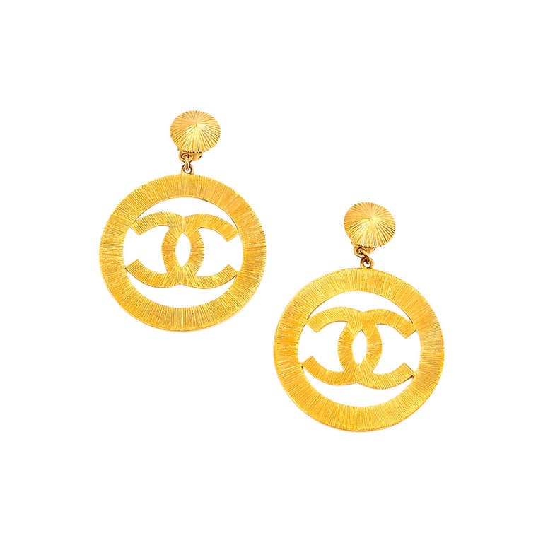 Chanel Vintage CC Sunburst Icon Hoop Logo Earrings For Sale at 1stDibs